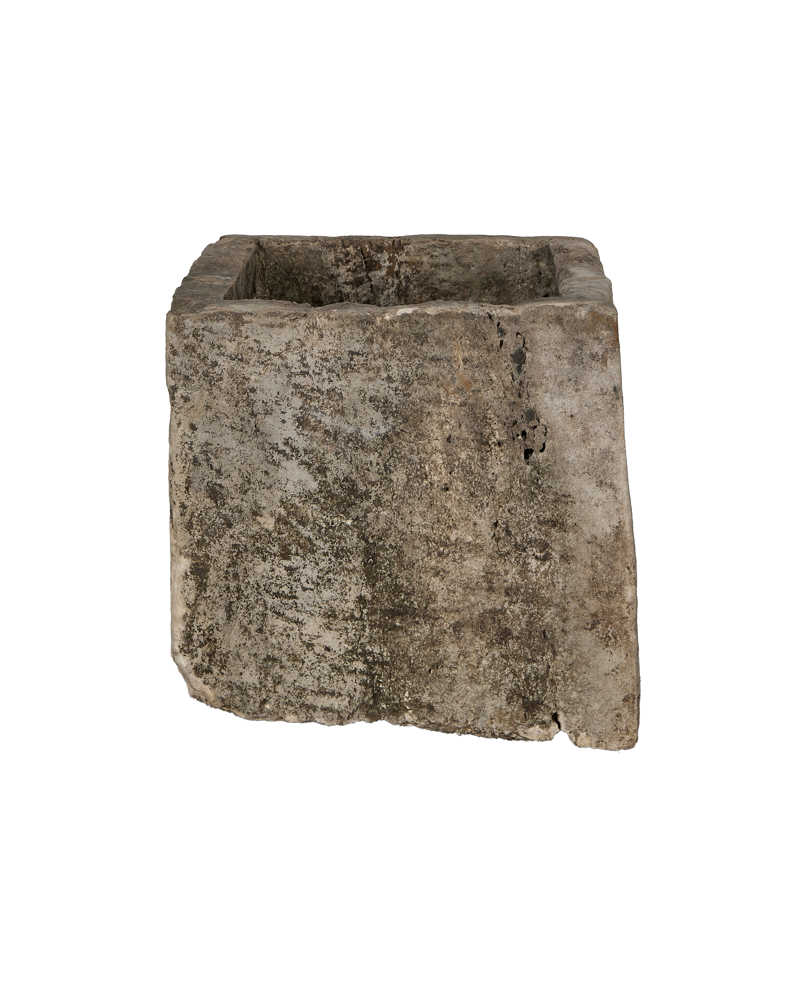 Distressed vintage Indonesian limestone trough with rough, weathered texture and visible side cracks.