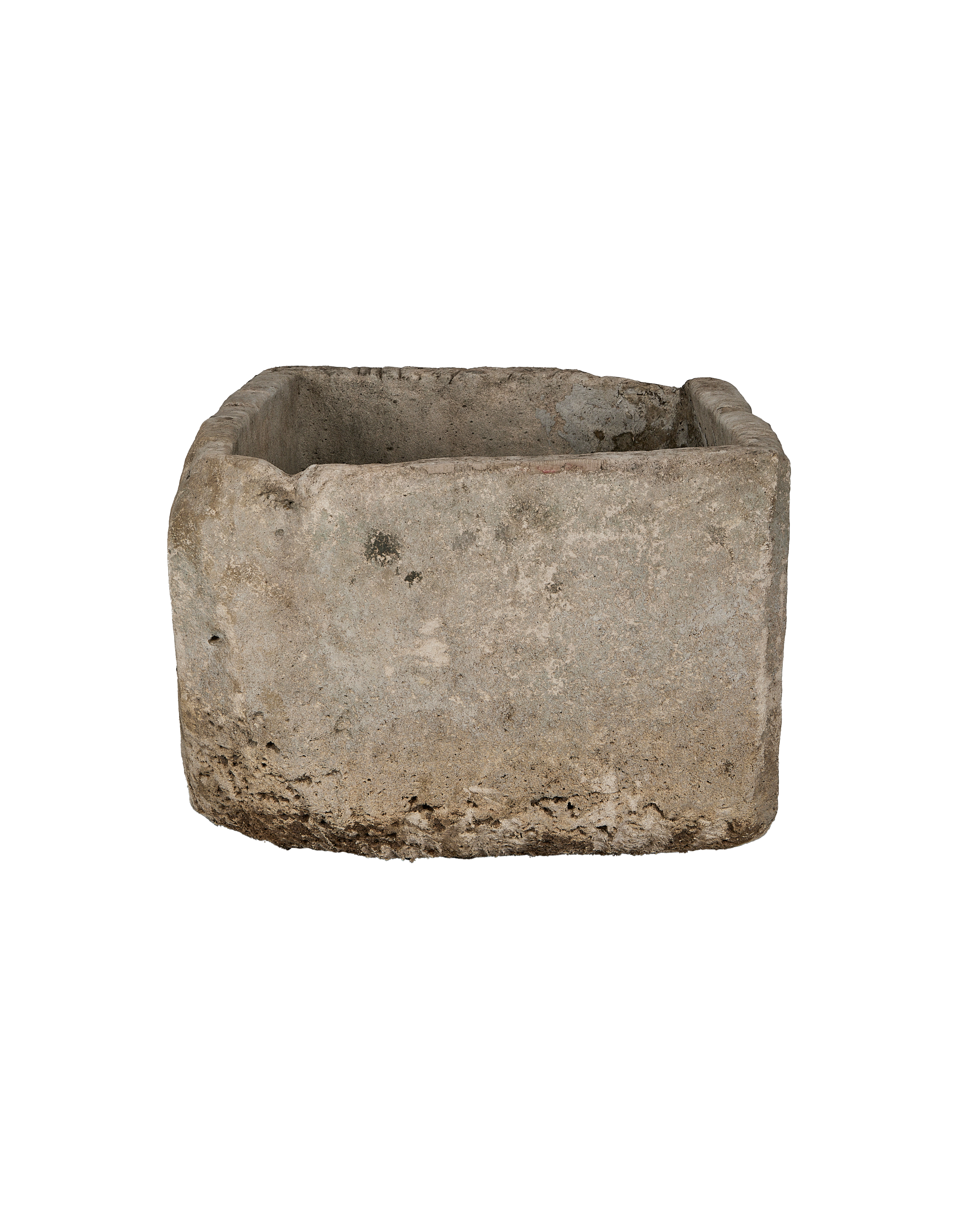 Rectangle vintage limestone trough side view, showing weathered, rough texture.