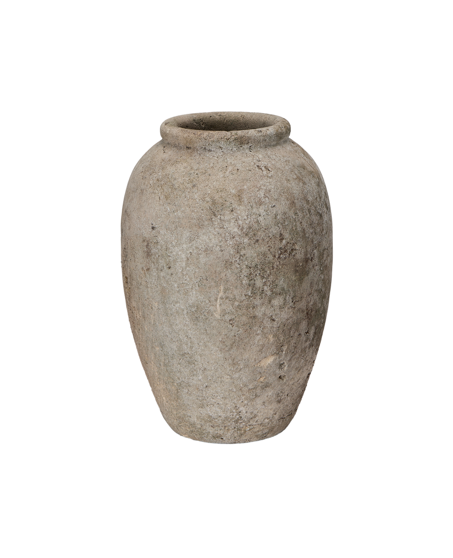 Vintage Indonesian stone vase, weathered gray texture, close-up view of full round body.