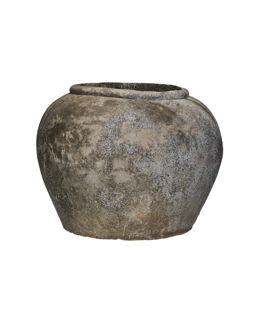 Vintage Indonesian OAK stone pot, side view, showing weathered, textured surface and rim.