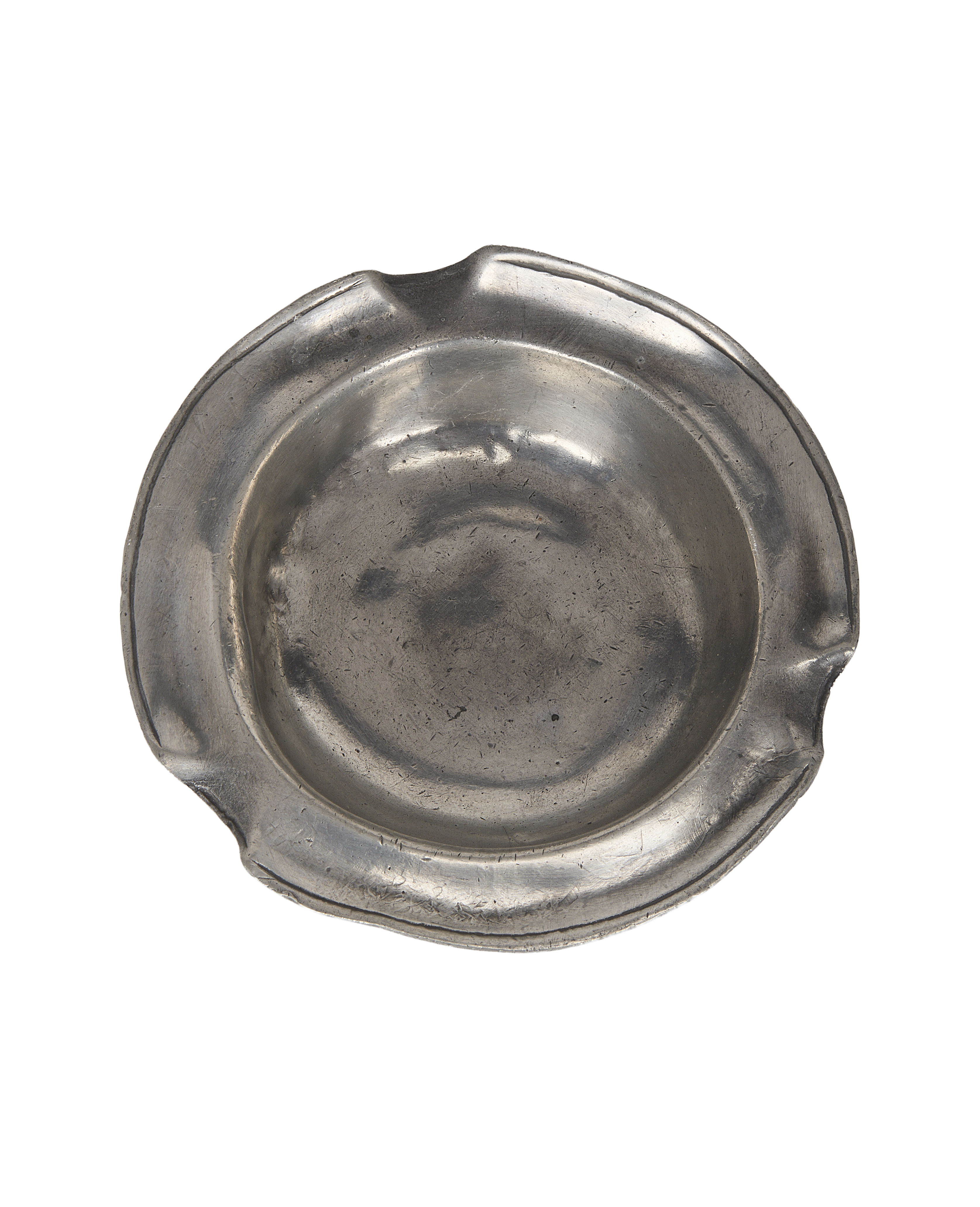 Vintage French pewter ashtray, top-down view revealing aged patina and cigarette rests.