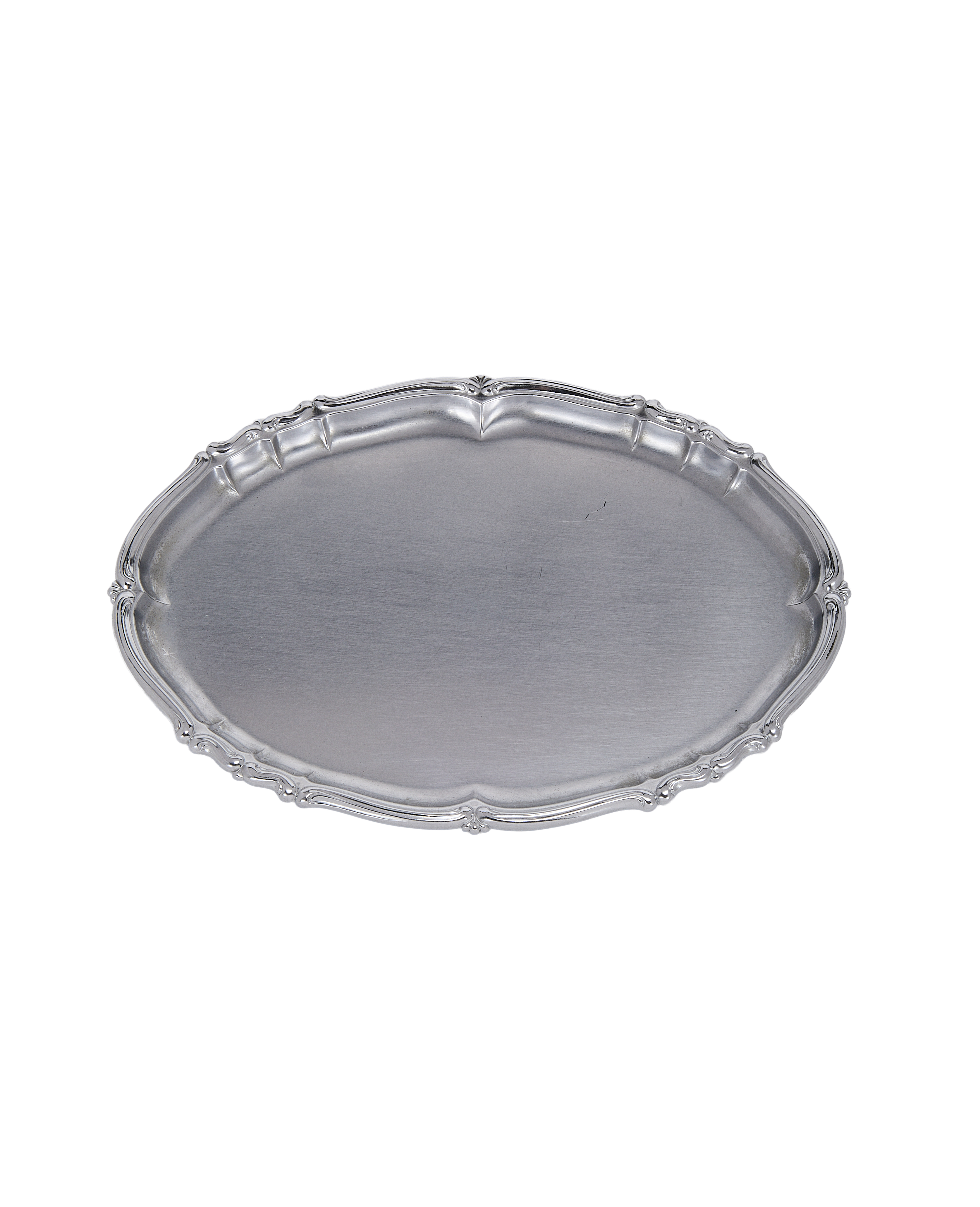Vintage French oval silver-plated serving tray with ornate scalloped edge.