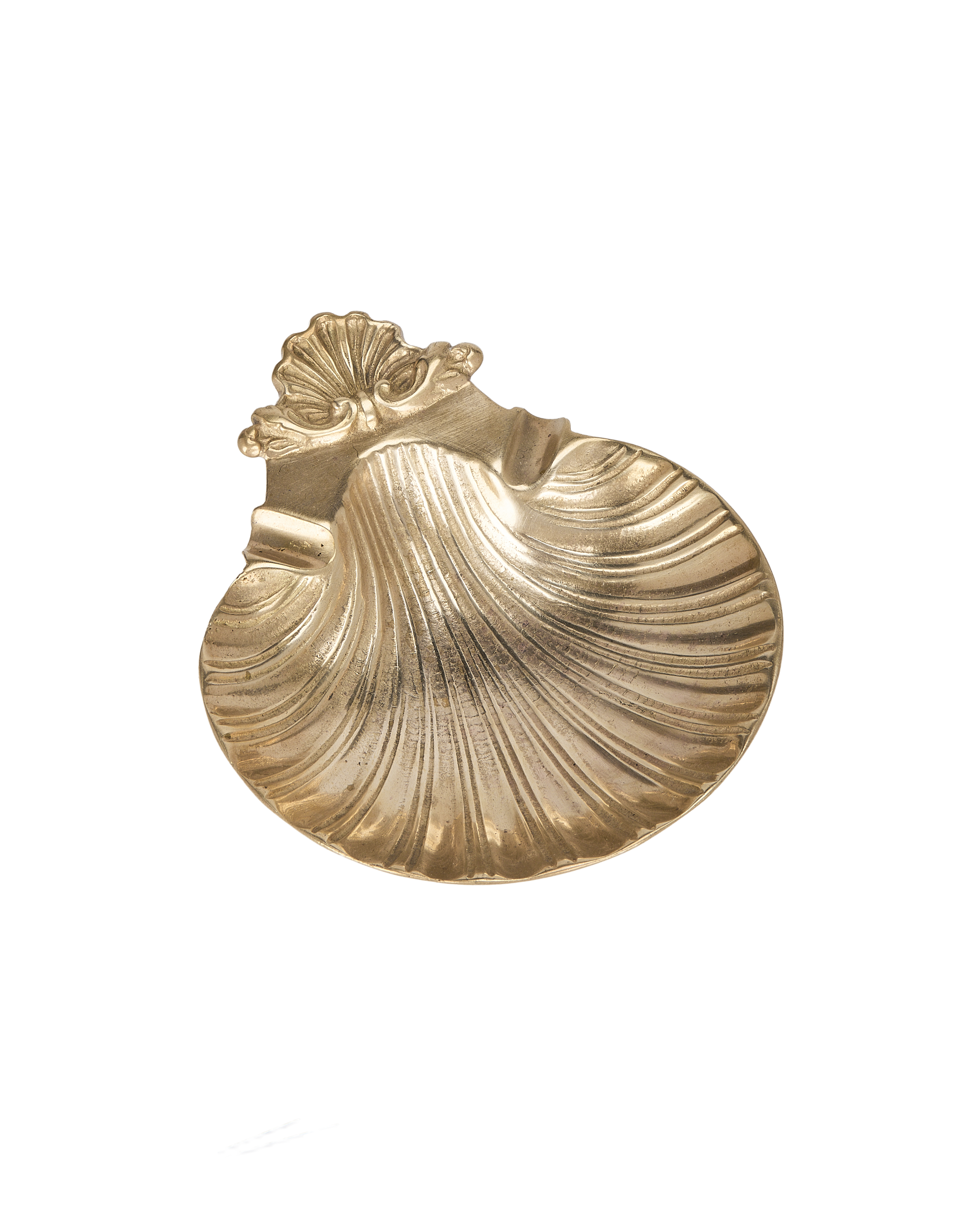 Vintage French brass shell vide poche with intricate fluted details, top view.