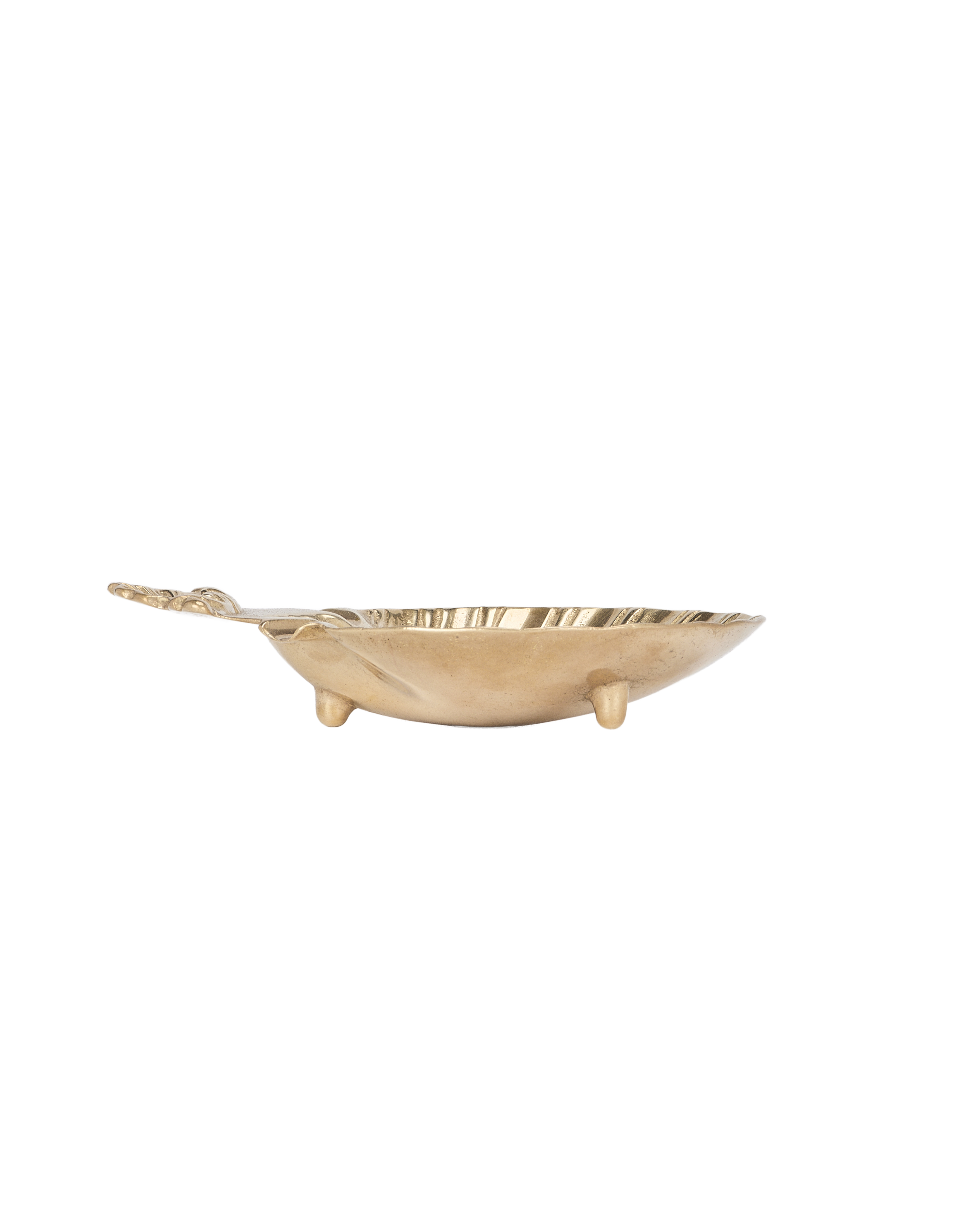 Vintage French brass shell vide poche, angled side view of three short legs.