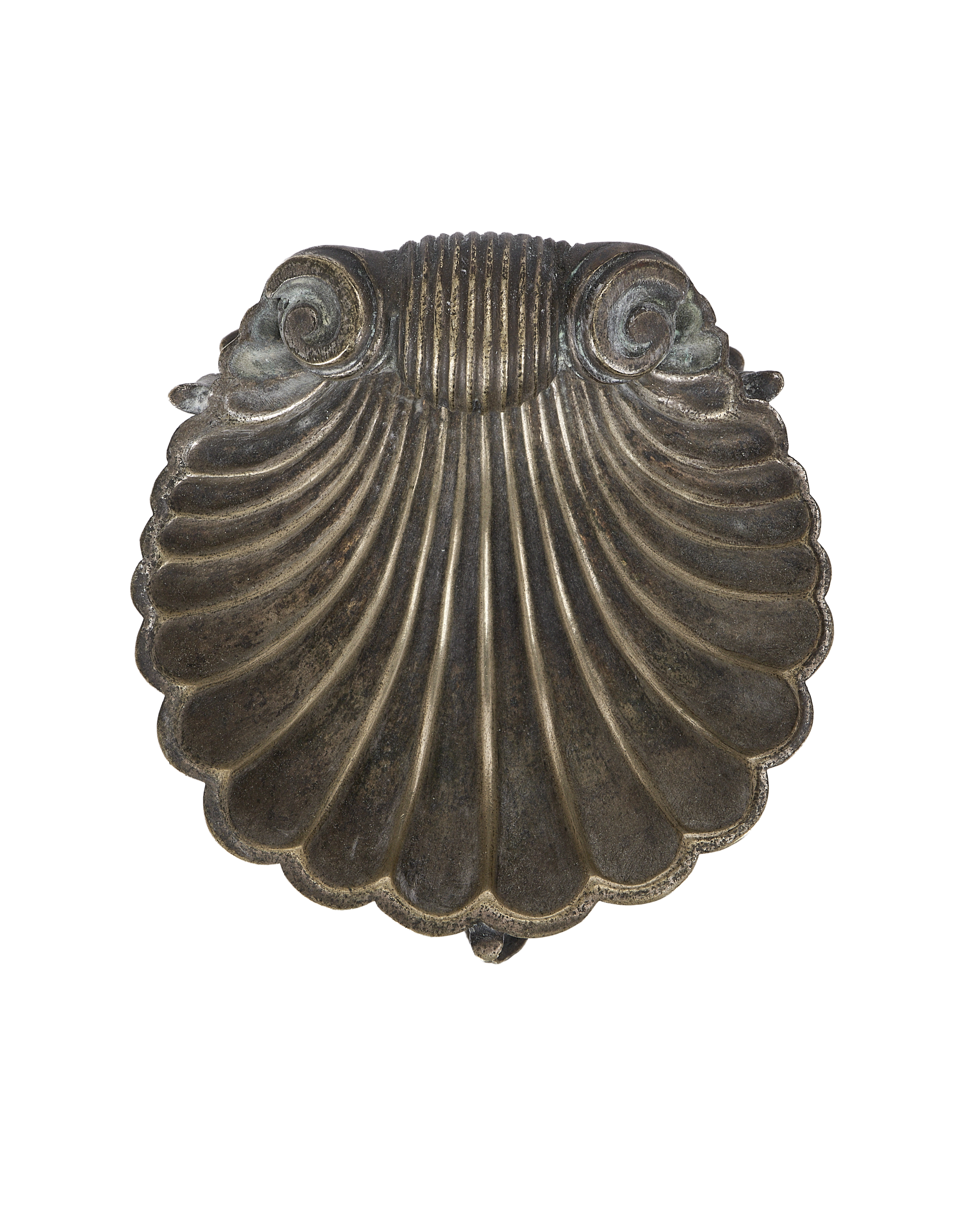 Vintage brass shell ashtray from France, showing ornate scrollwork and ribbed detailing.