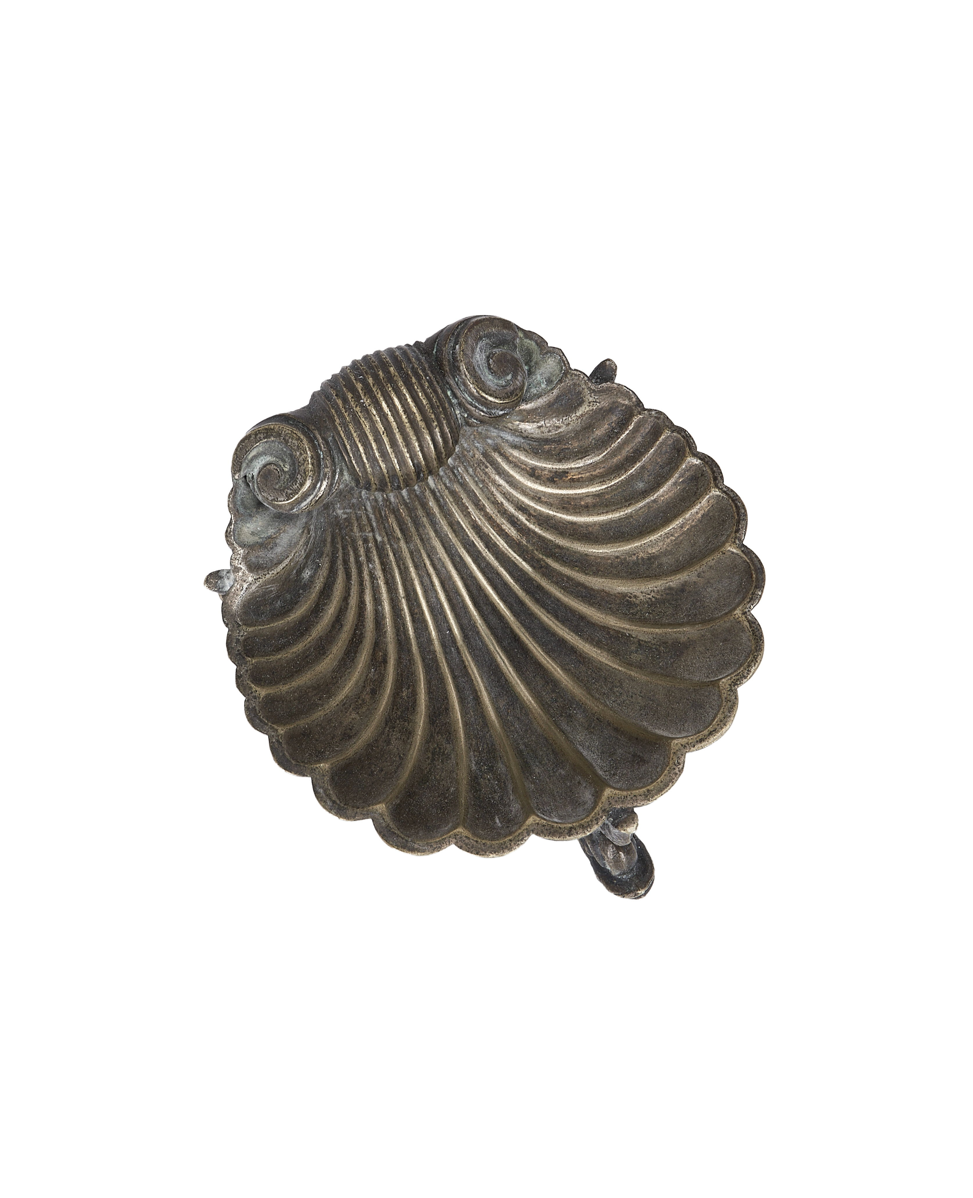 Vintage French brass shell ashtray, ornate ridged texture, front view on black.