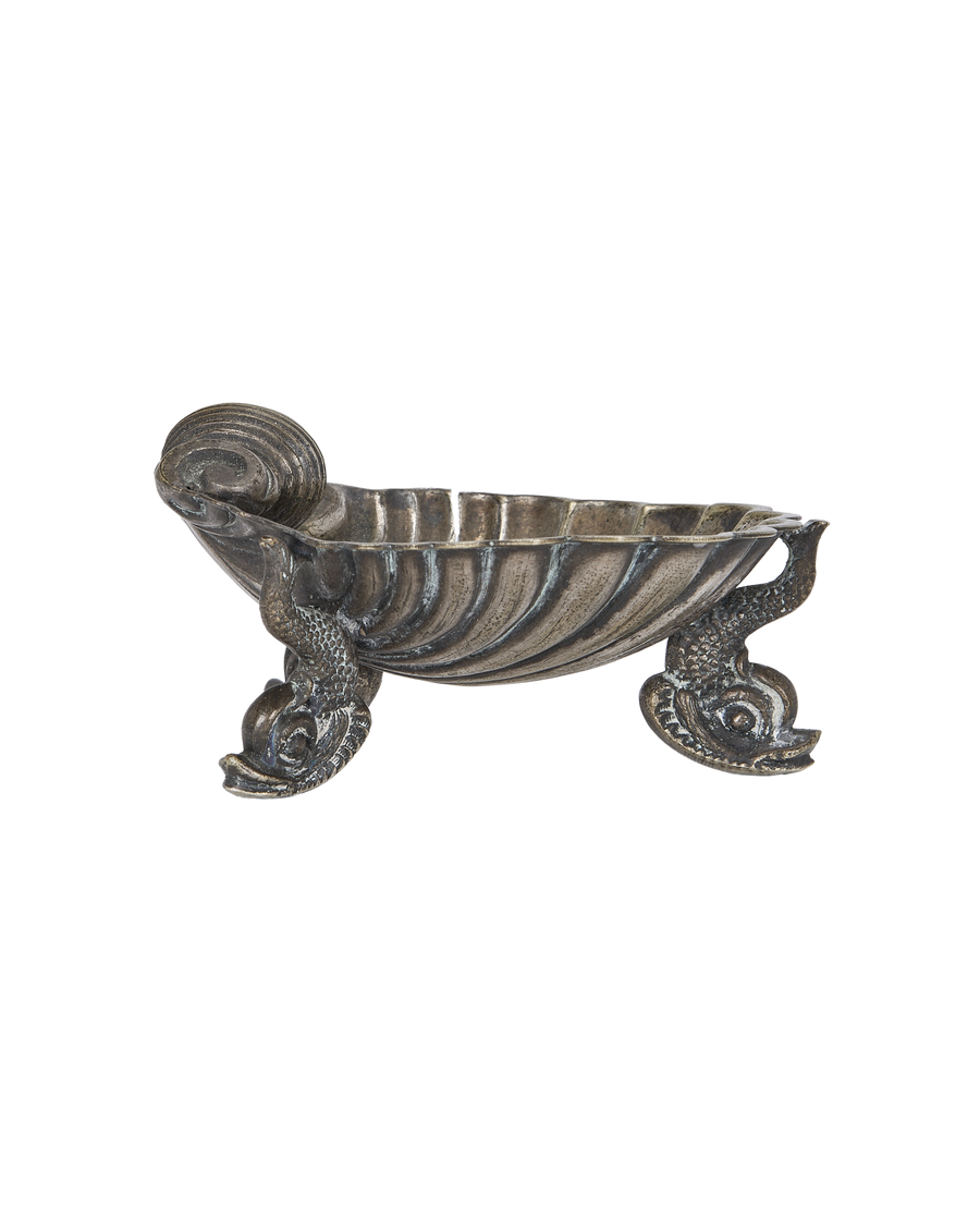 Vintage silver-tone shell ashtray with scrolled end and unique dolphin feet design from France.