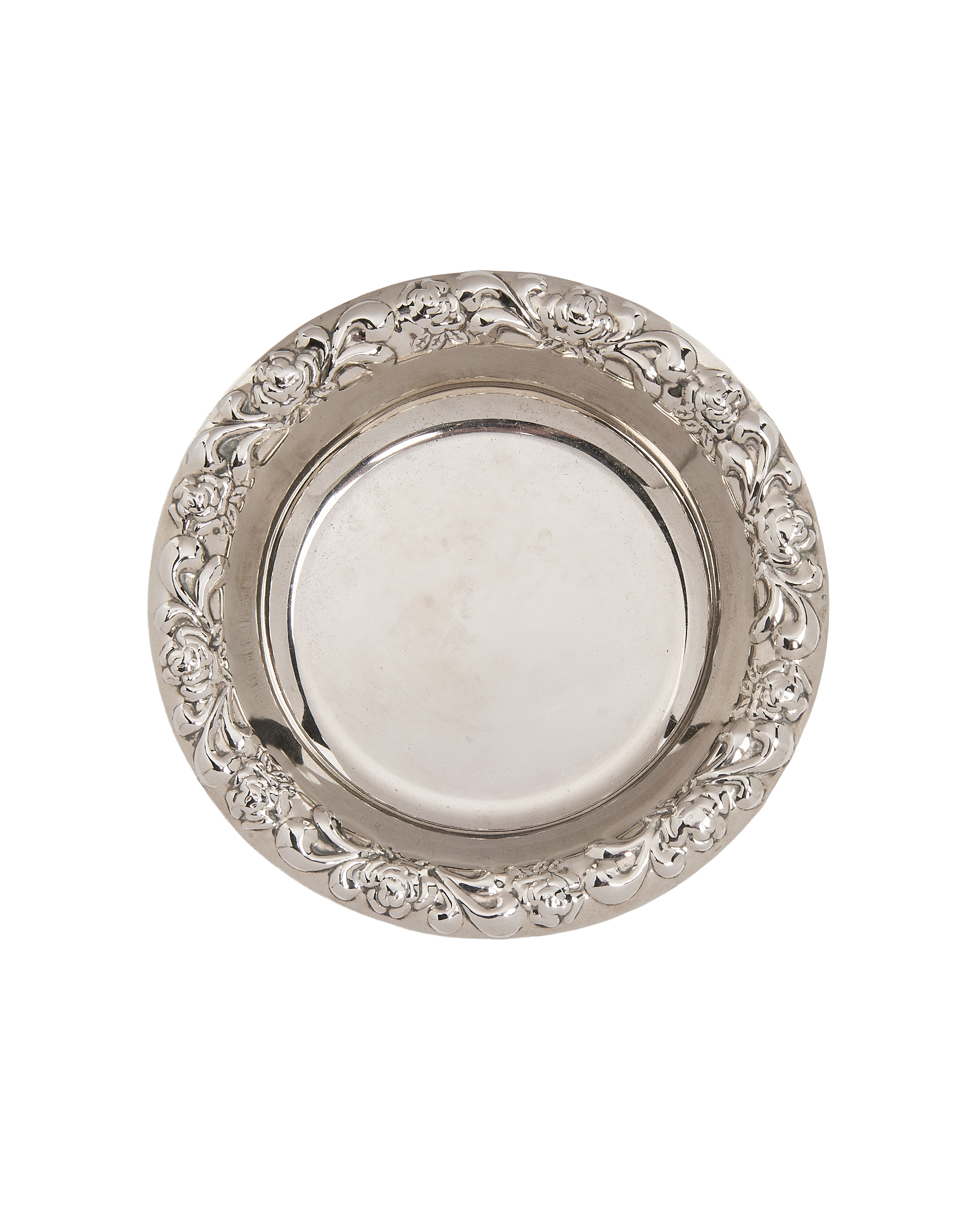 Vintage French silver-plated Vide Poche with intricate floral and scrollwork border.