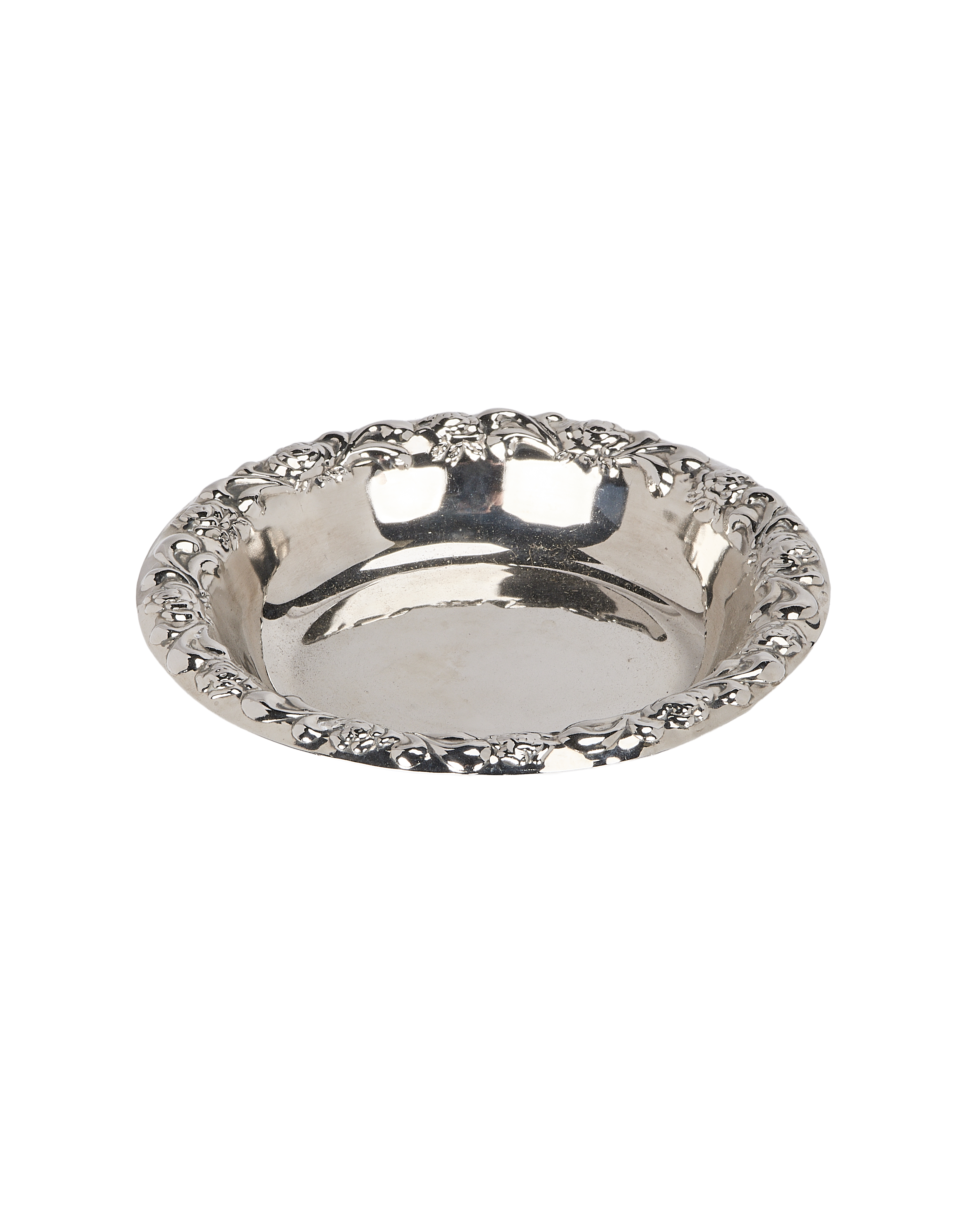 Vintage French silver-plated Vide Poche bowl, showing detailed floral rim design.