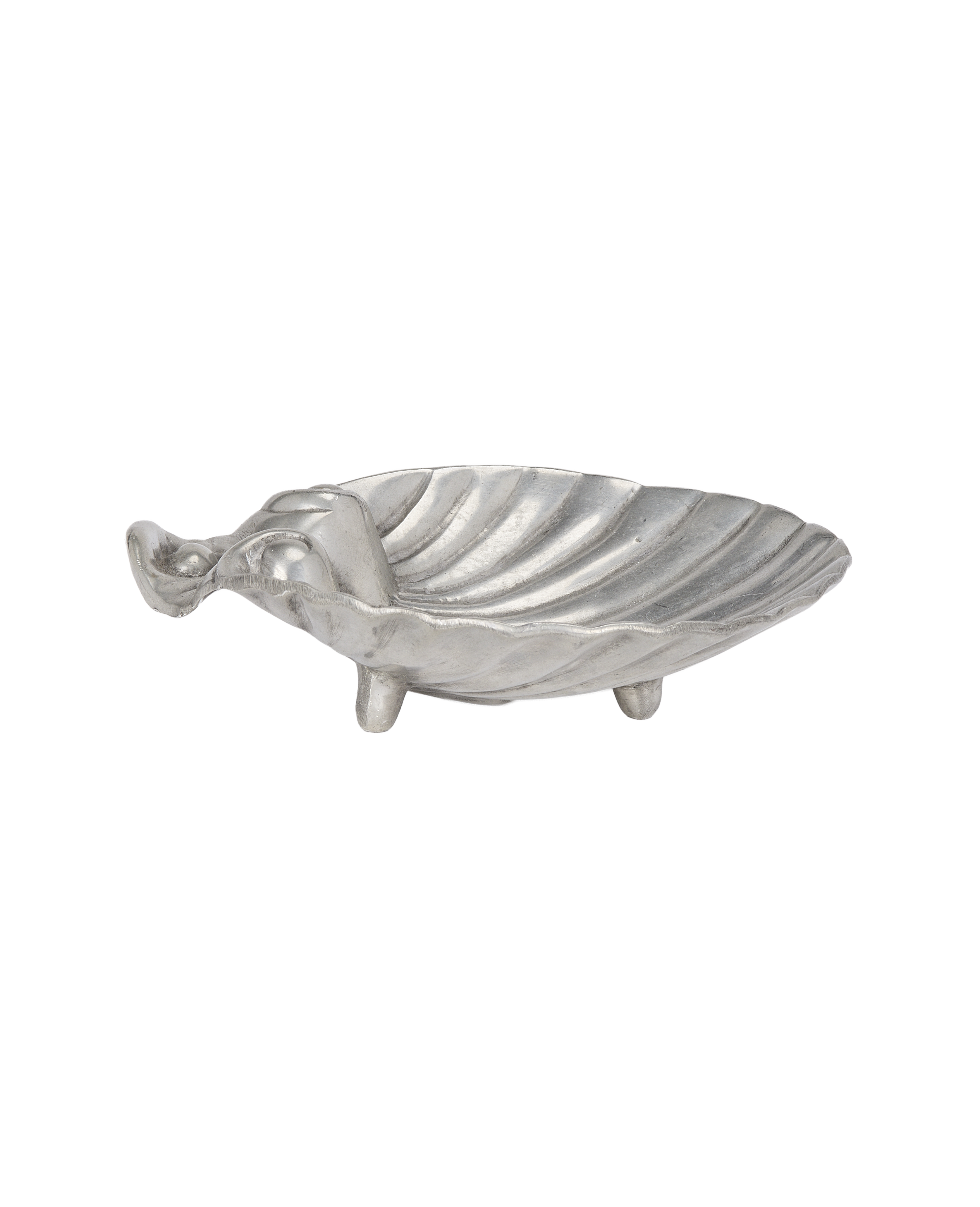 Vintage French pewter shell vide poche, angled right, showcasing the three feet.