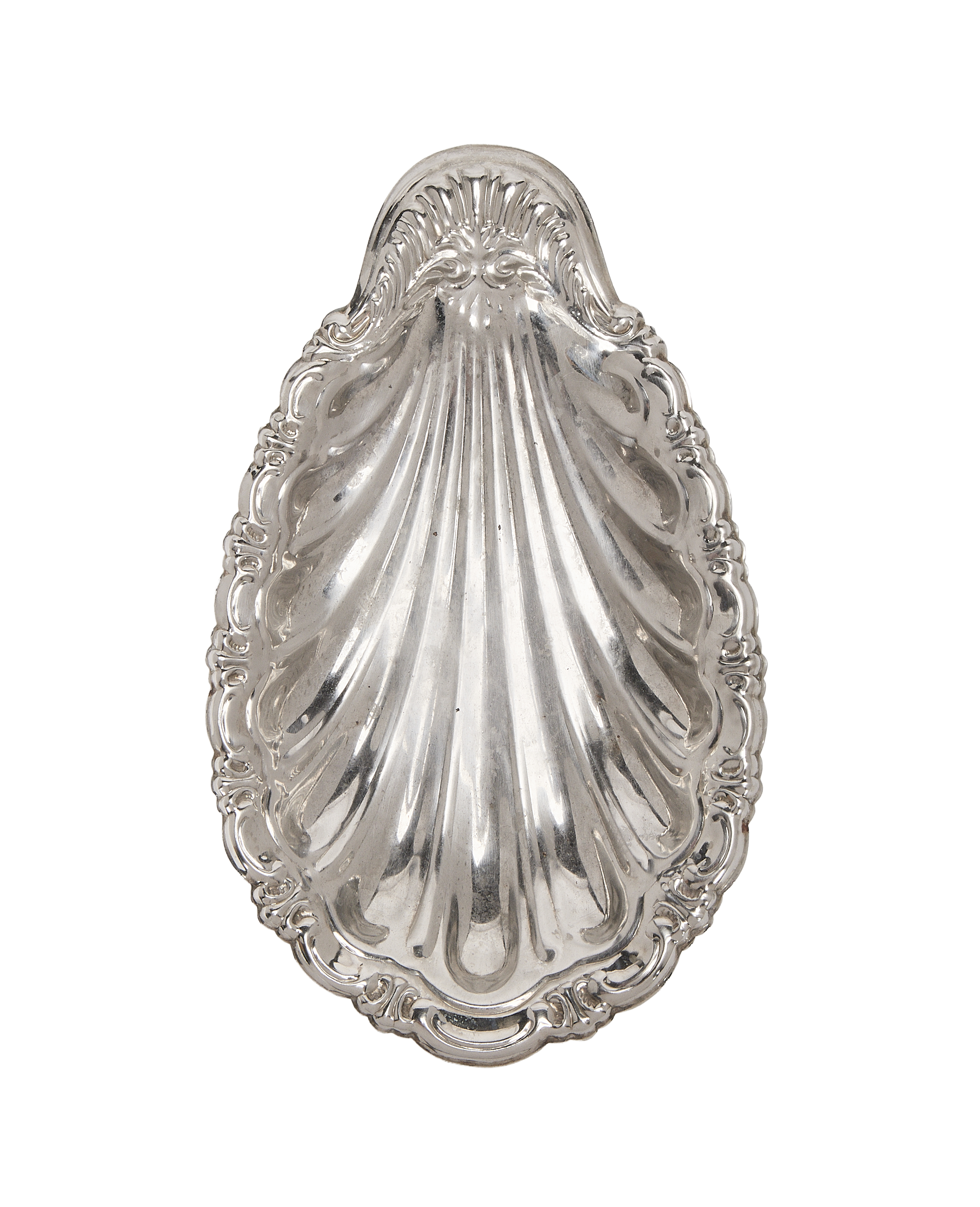 Vintage French silver vide poche detailed with shell fluting and ornate rococo rim.