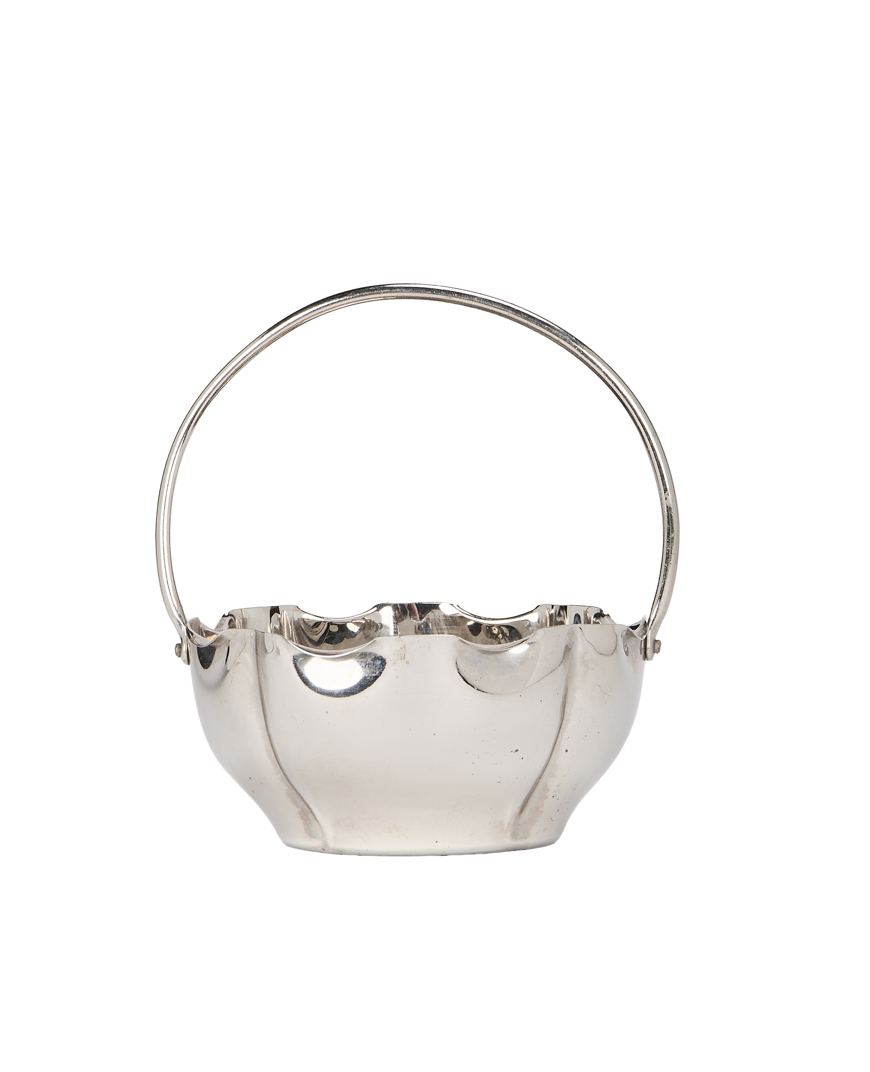 Vintage French silver-plated basket, side view detailing the classic curved handle.