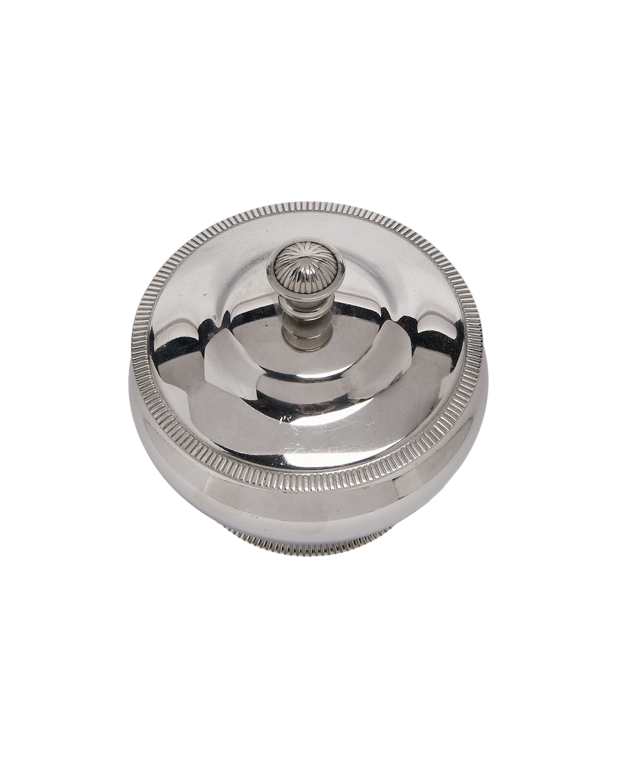 Vintage French steel sugar pot, top-down view of the ribbed lid and elegant finial.