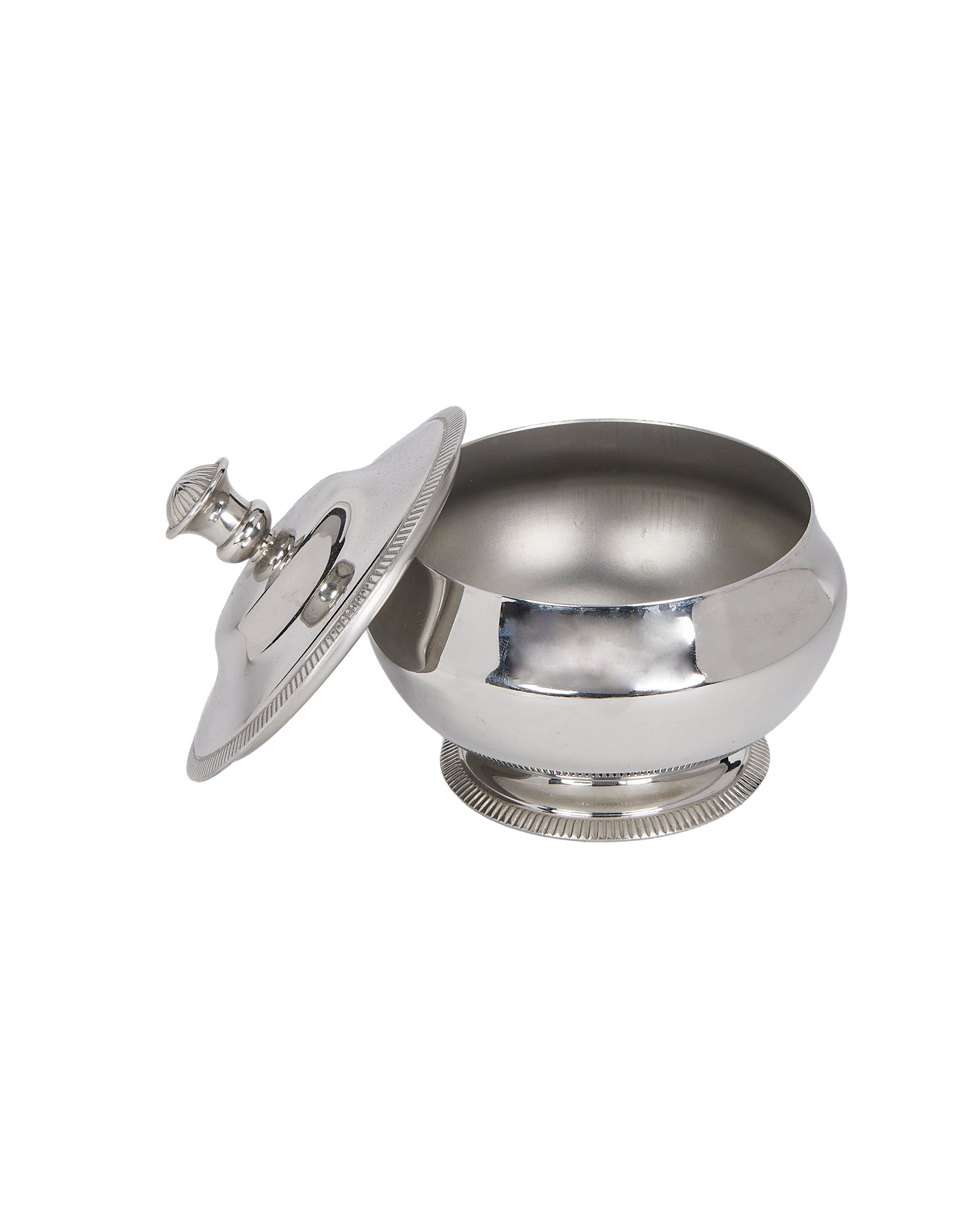 Vintage French steel sugar pot, lid angled open, revealing polished interior and ribbed base.