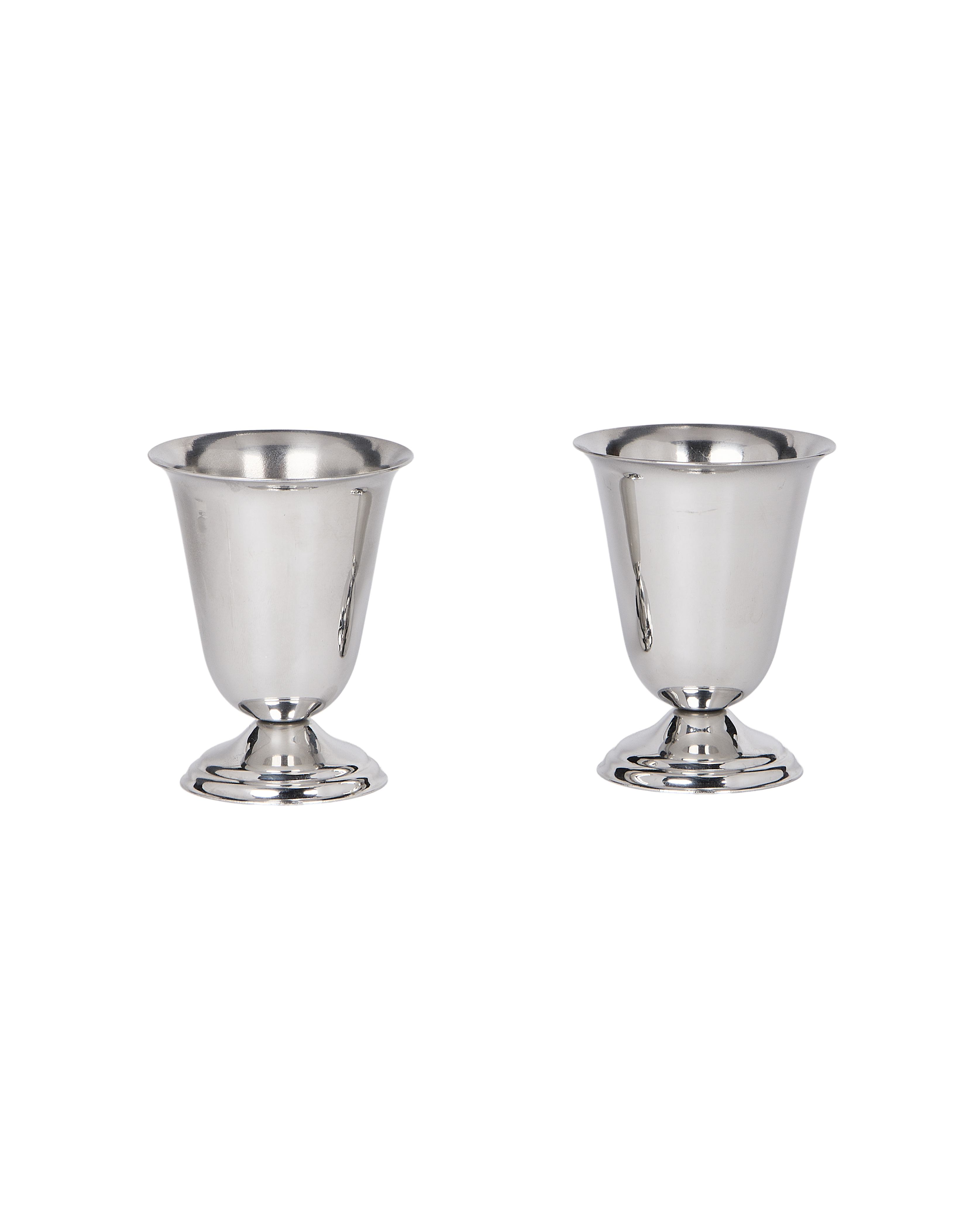 Two French vintage steel cups, polished silver, featuring flared rims and pedestal bases.