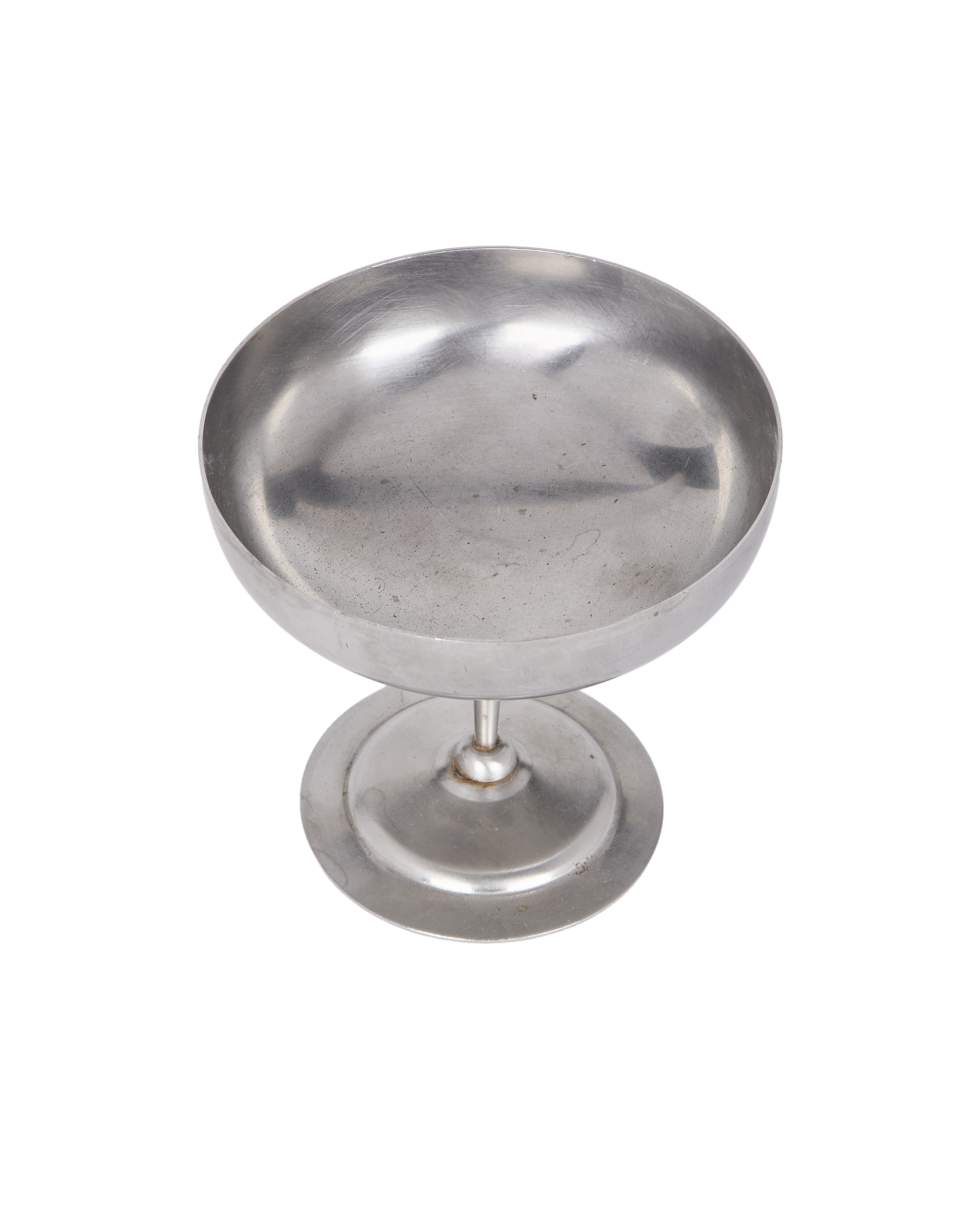 Vintage matte metal cup, slightly angled view, showing interior and pedestal base.