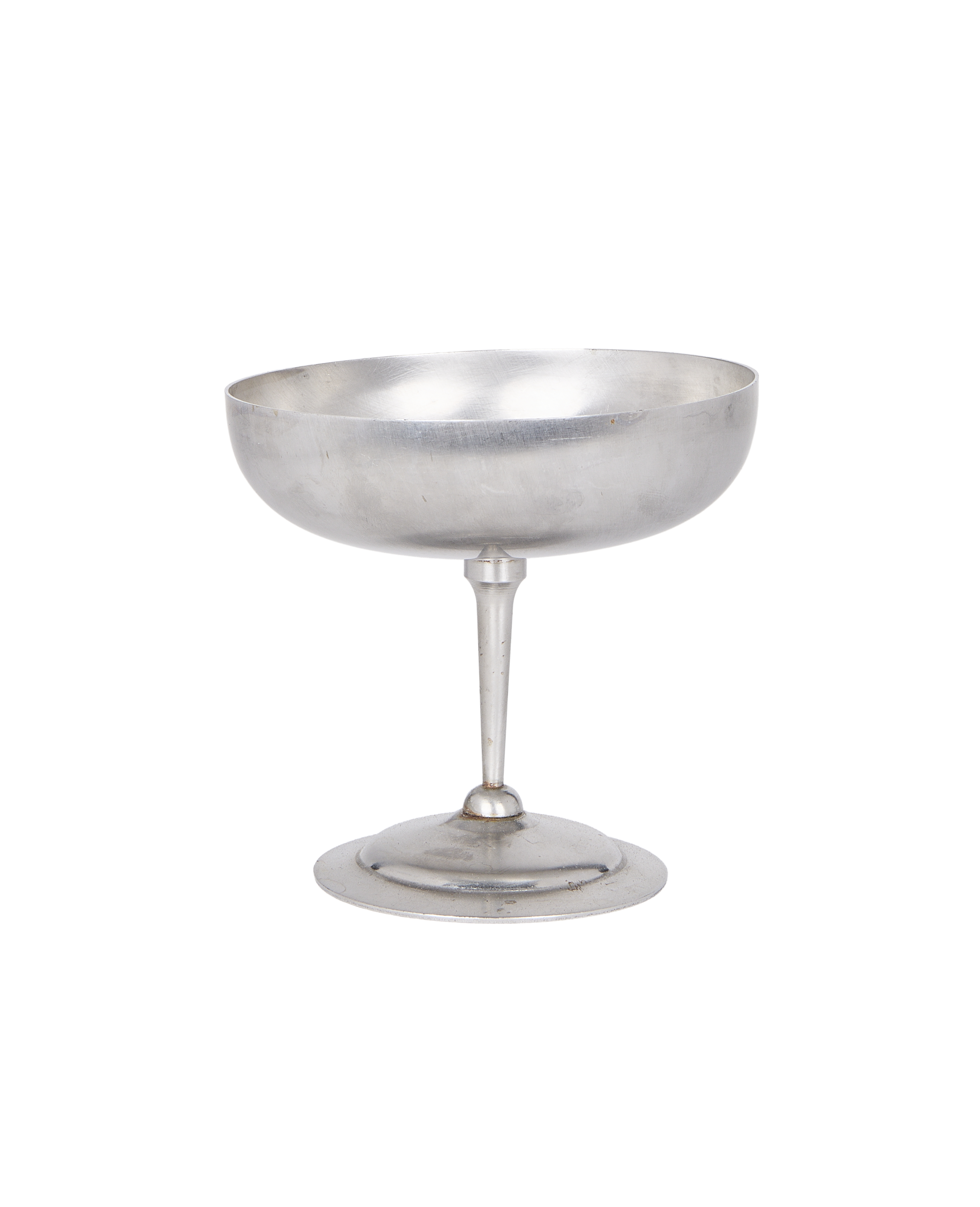 Vintage matte metal cup, single French coupe, showing aged patina and wide base.