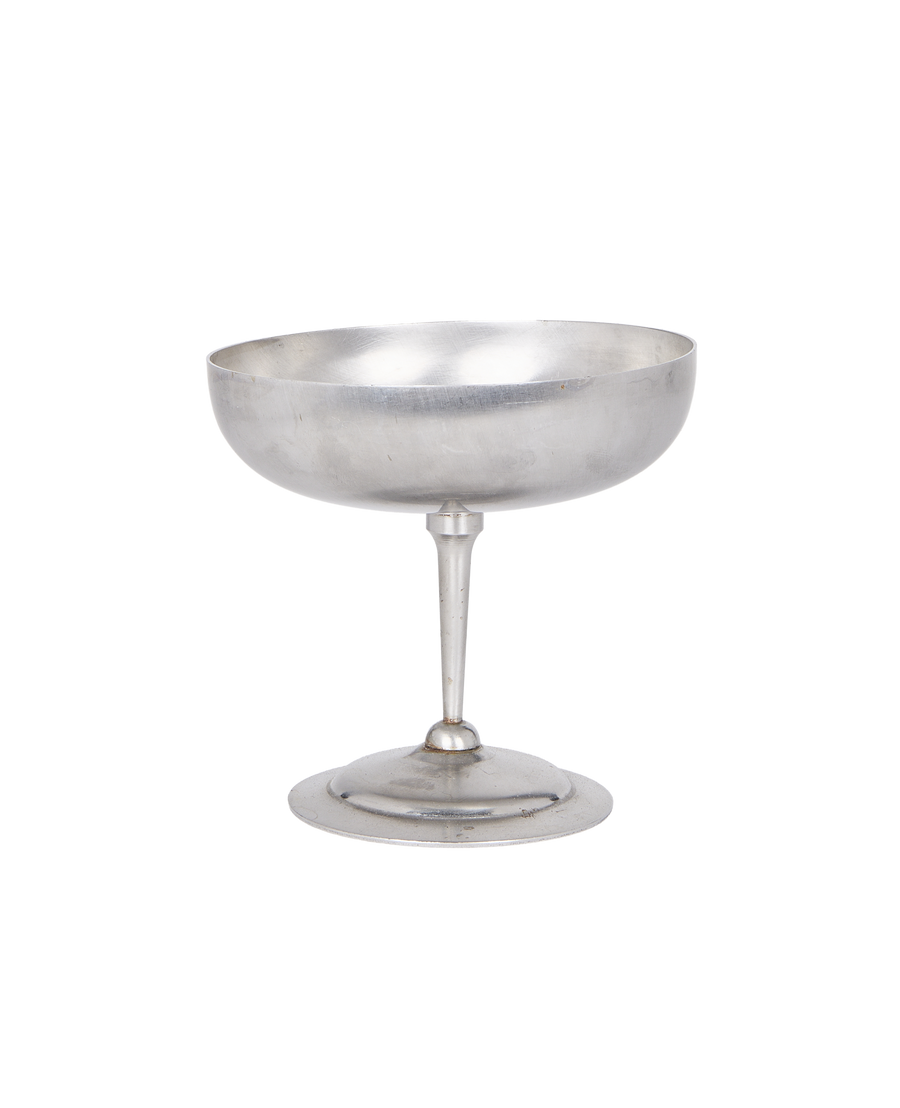 Vintage matte metal cup, single French coupe, showing aged patina and wide base.