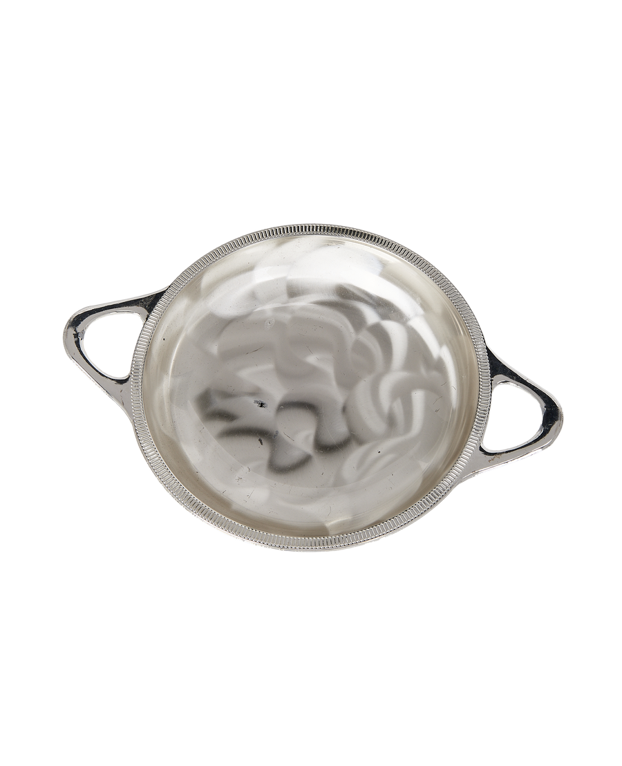 Vintage French pedestal dish, ornate silvery handles, shows bowl's shiny interior.