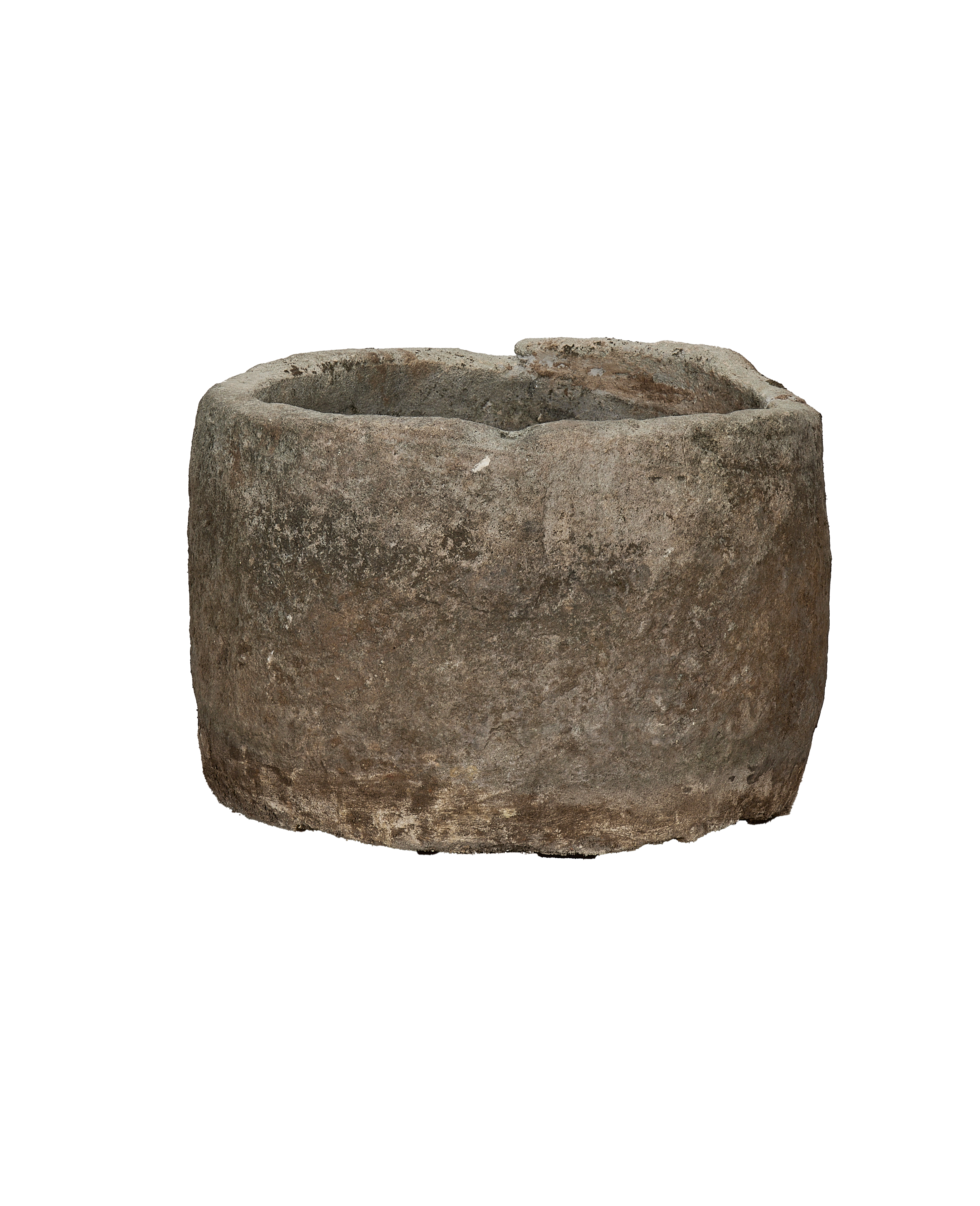 Vintage Indonesian limestone trough, showing a cracked, weathered top rim detail.