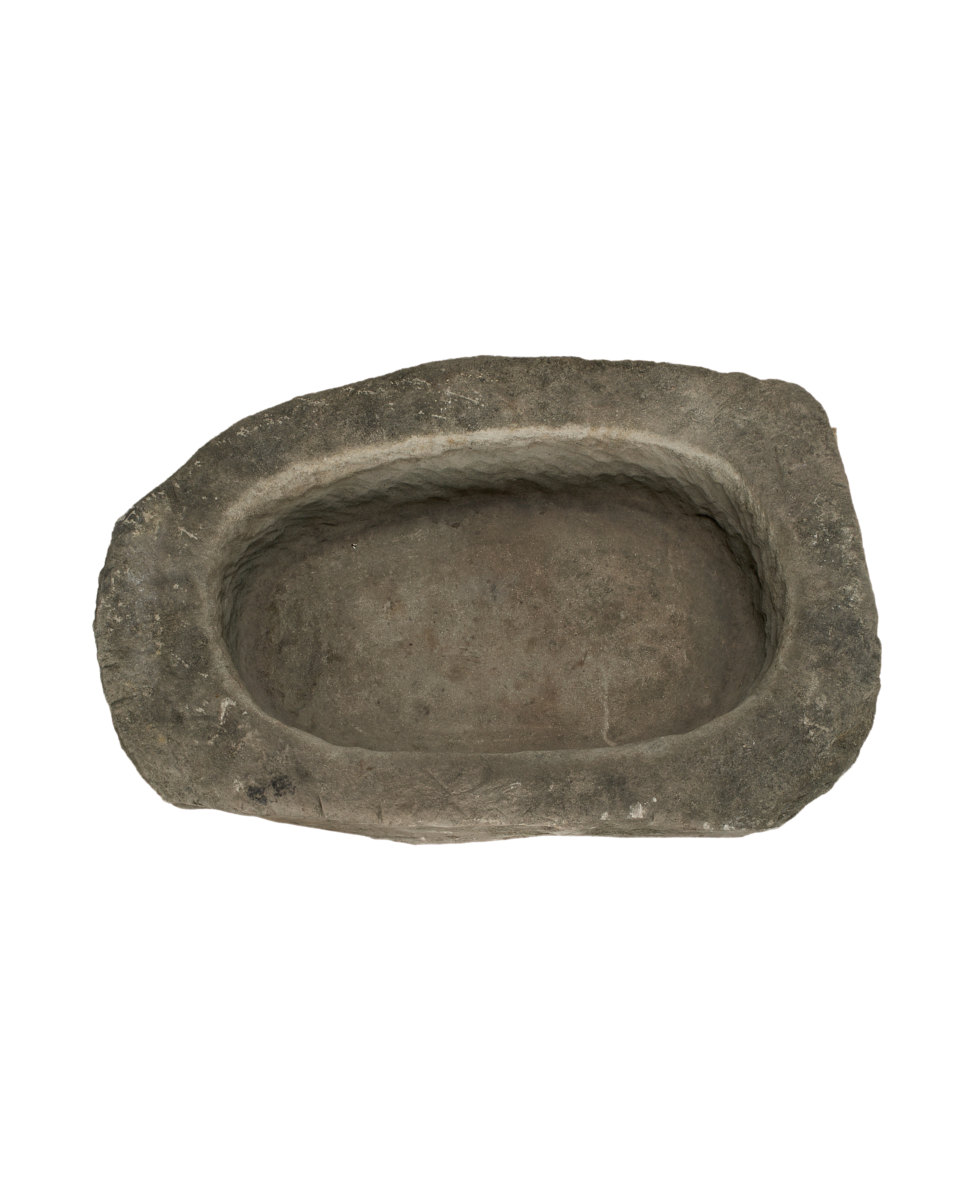 Vintage Indonesian oblong limestone trough, dark gray and textured, showing interior detail and worn rim.