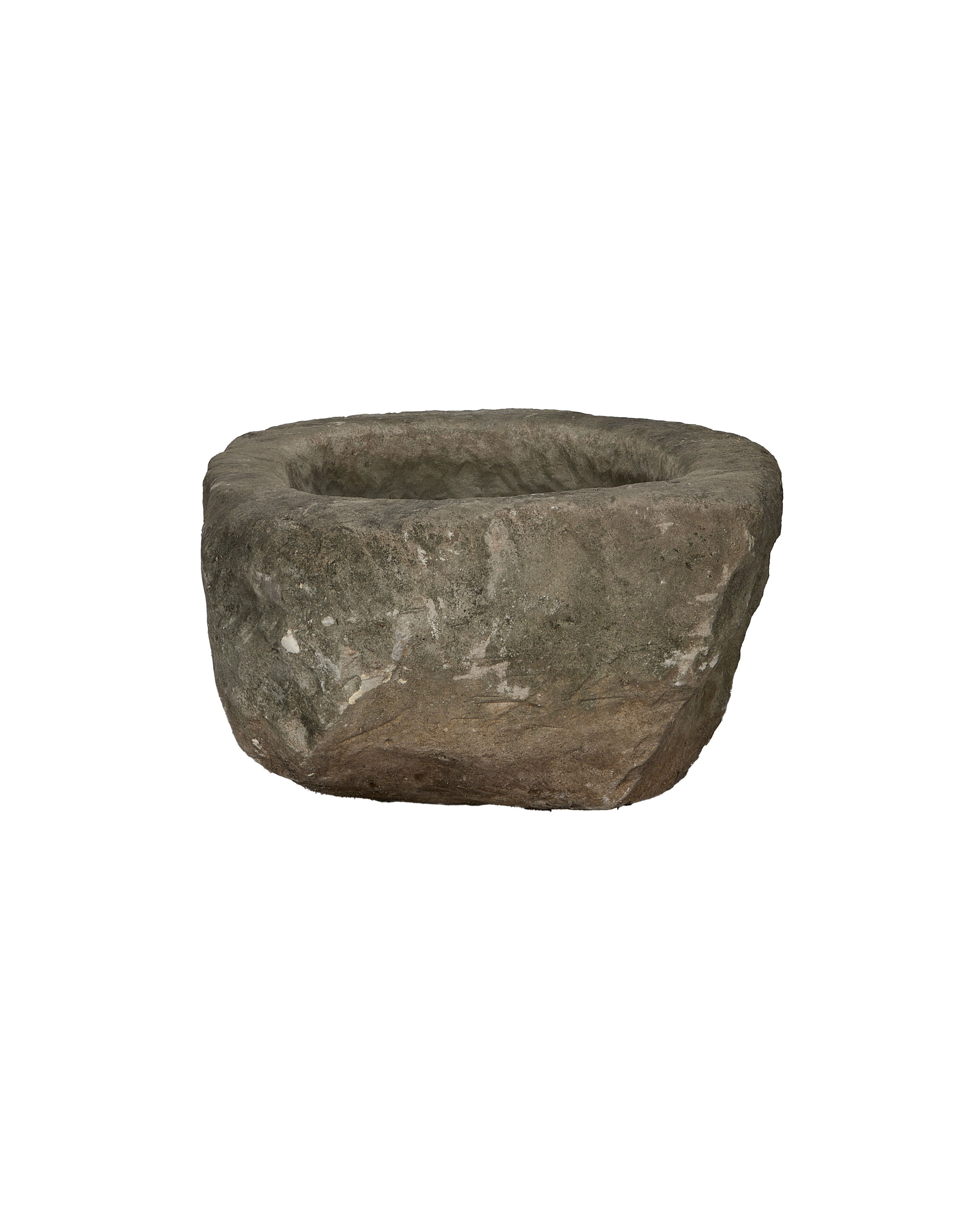 Vintage oblong limestone trough from Indonesia, showing its rough textured exterior and raw edges.