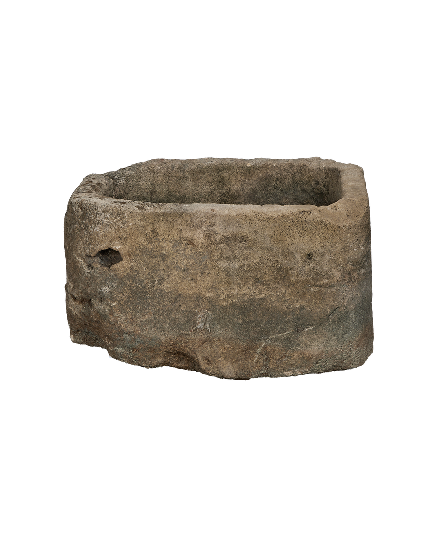 Vintage oblong limestone trough from Indonesia, weathered surface and organic imperfect edges.