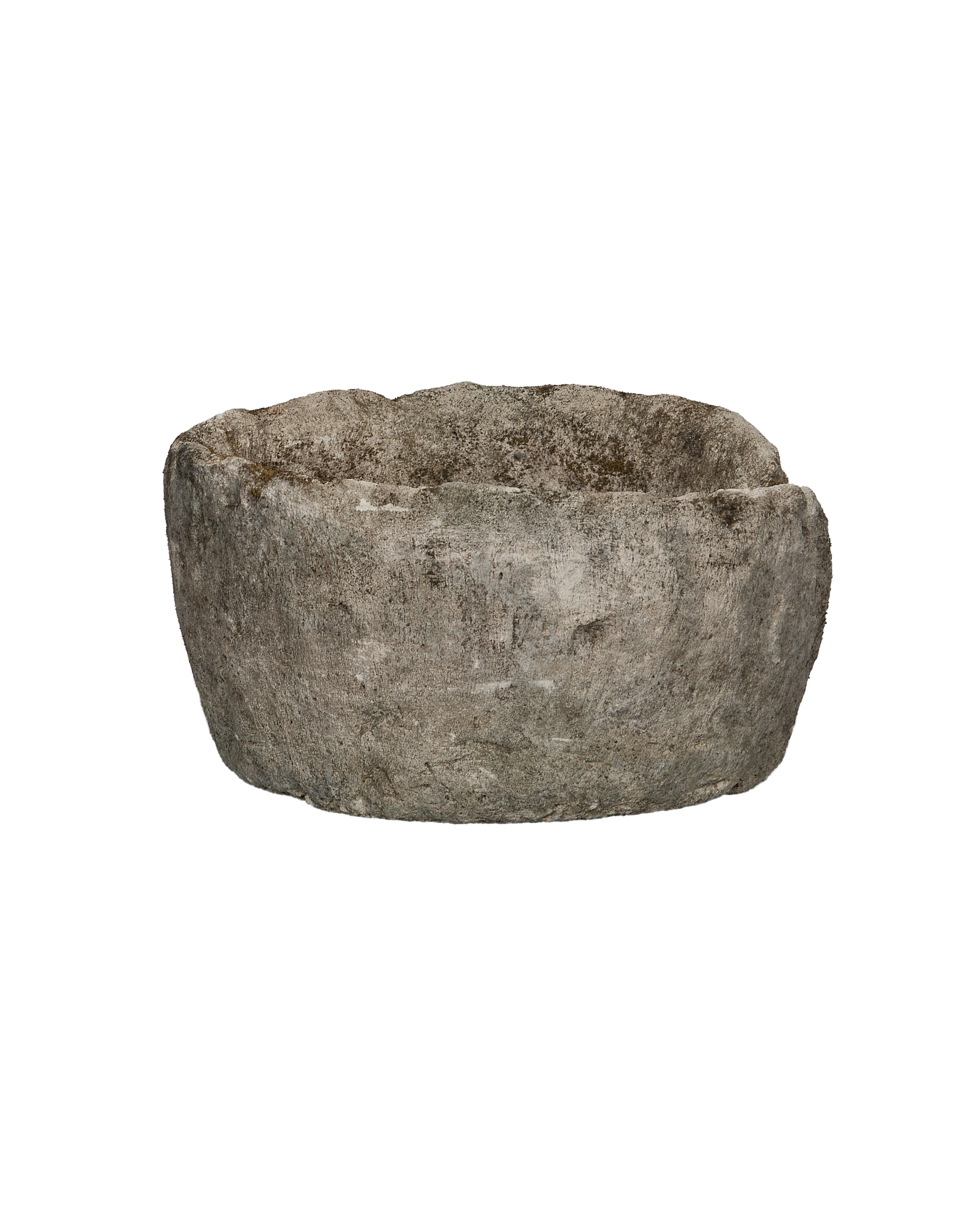 Vintage Indonesian round limestone trough, showing its rough texture and patinated surface.
