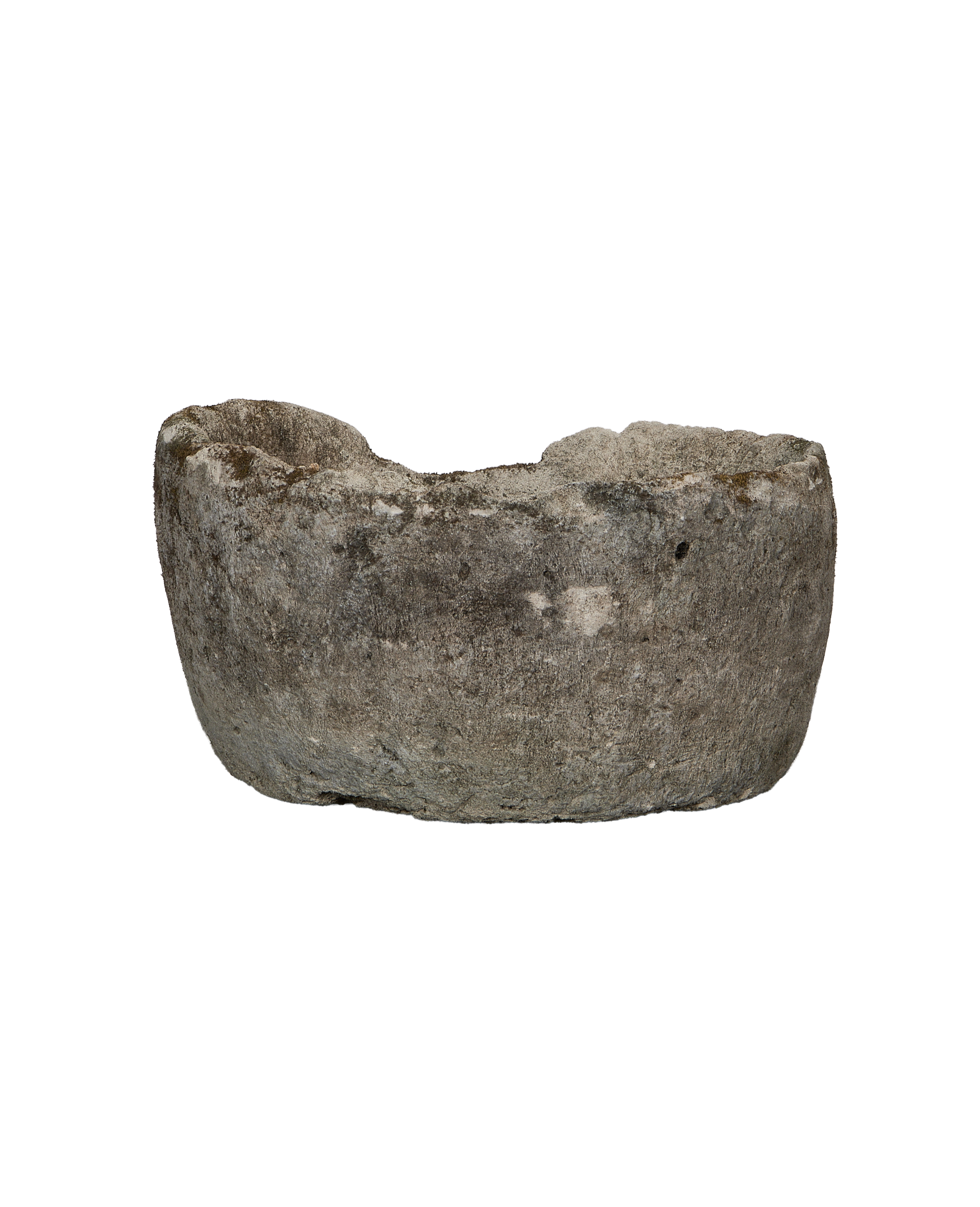 Vintage Indonesian round limestone trough, side profile, rough weathered texture, unique uneven rim.