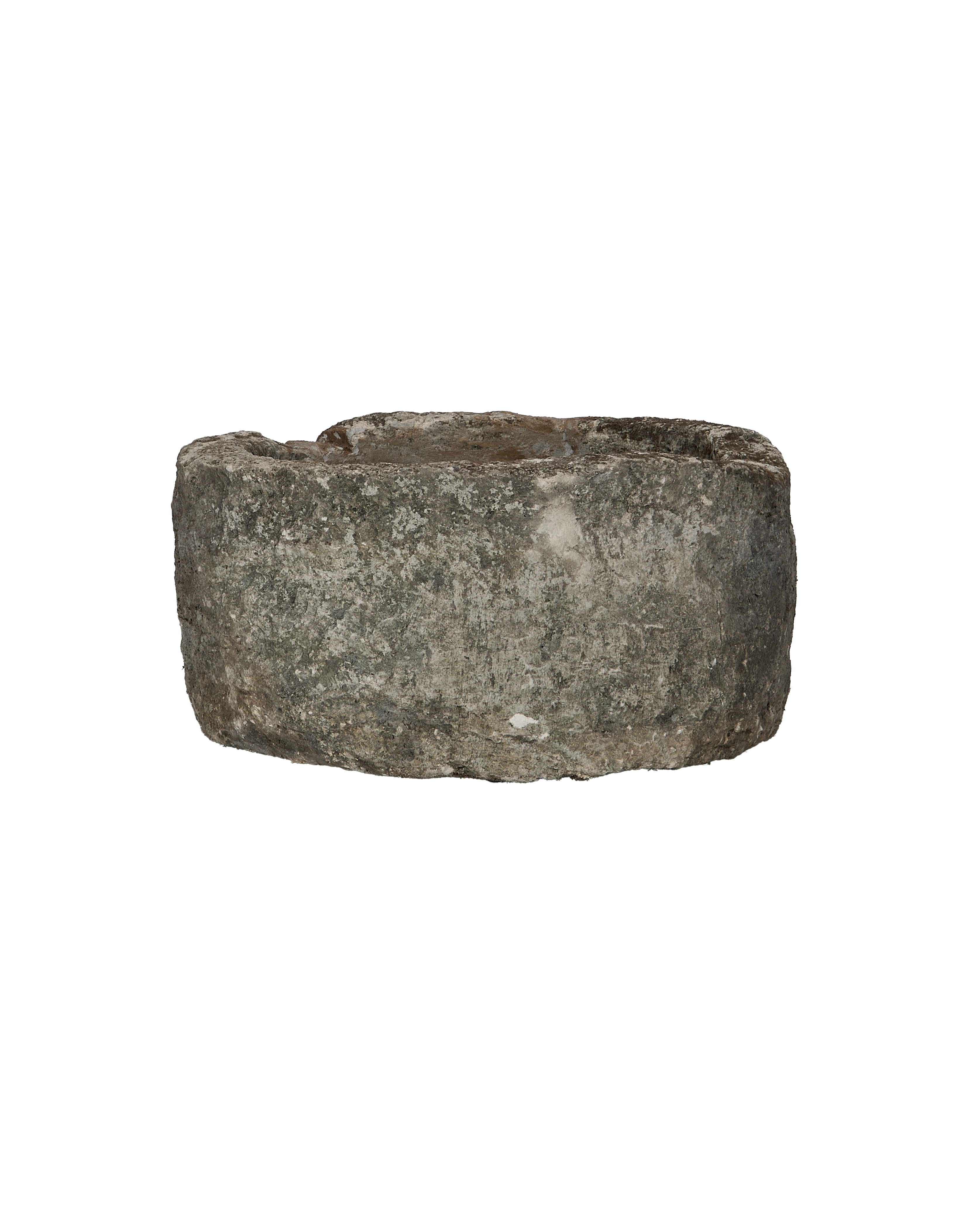 Round vintage Indonesian limestone trough, showing rugged texture and weathered surface with varying tones.