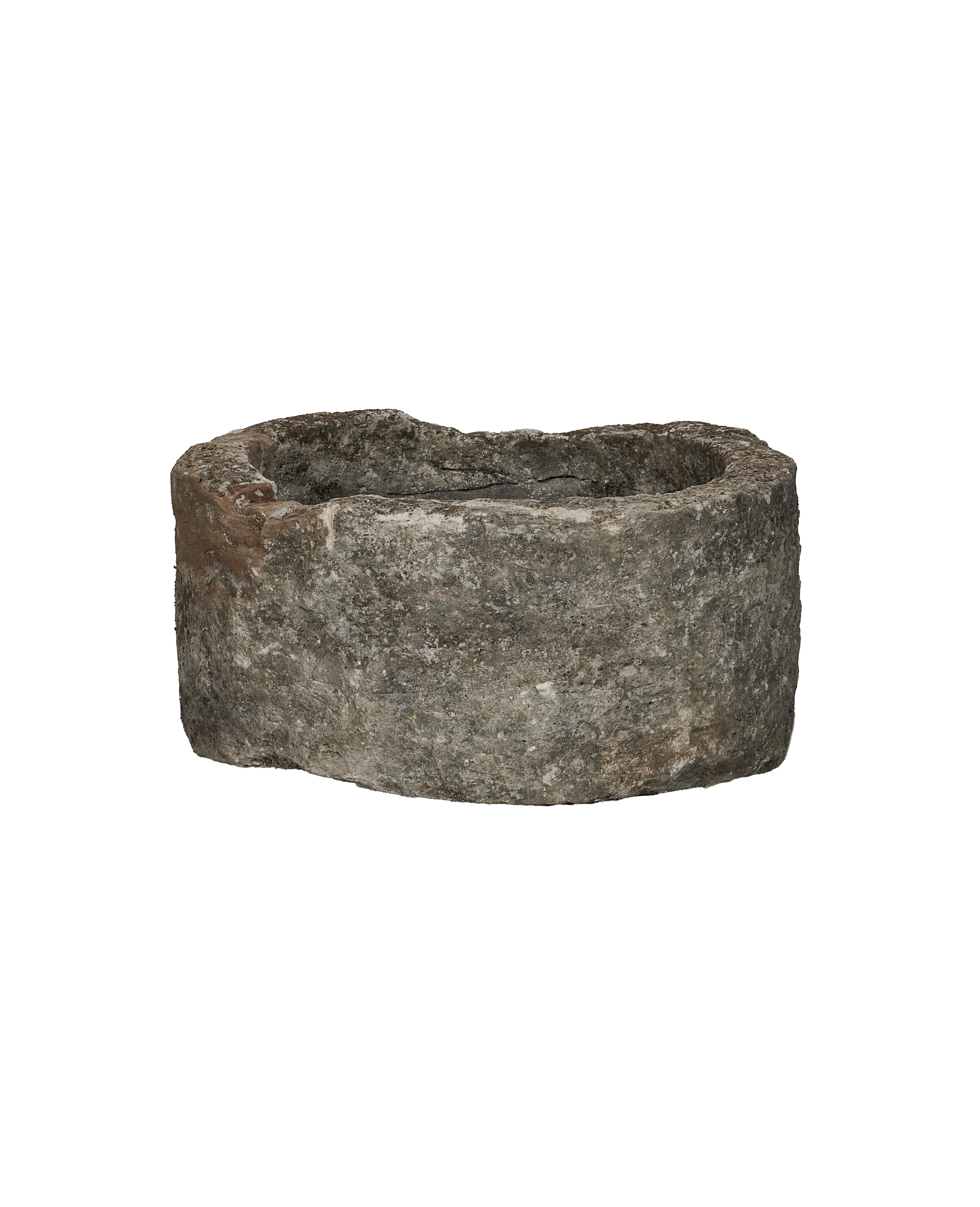 Vintage round limestone trough from Indonesia, showing rough texture and weathered patina.