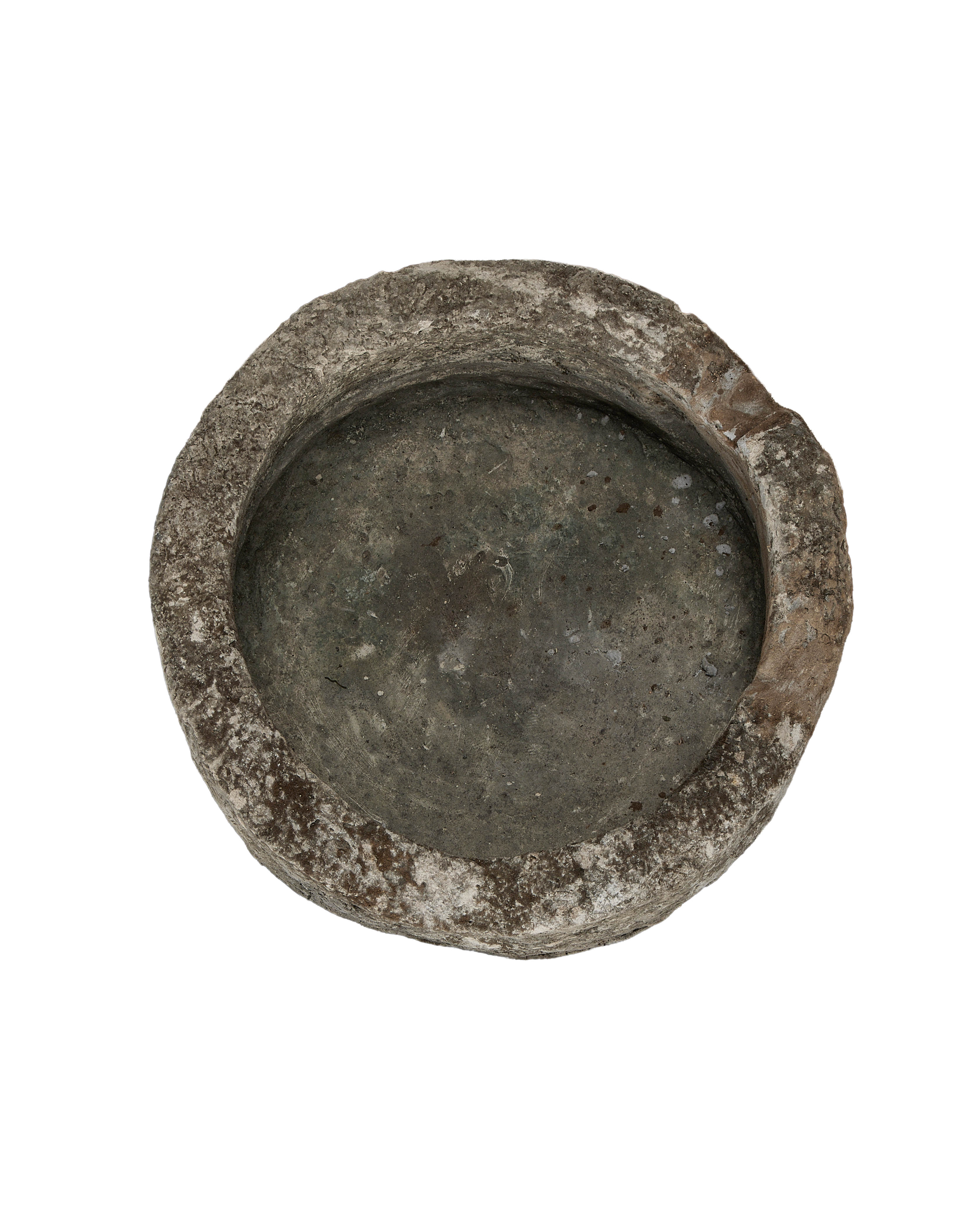 Vintage round Indonesian limestone trough, top-down view showing textured rim and weathered interior.
