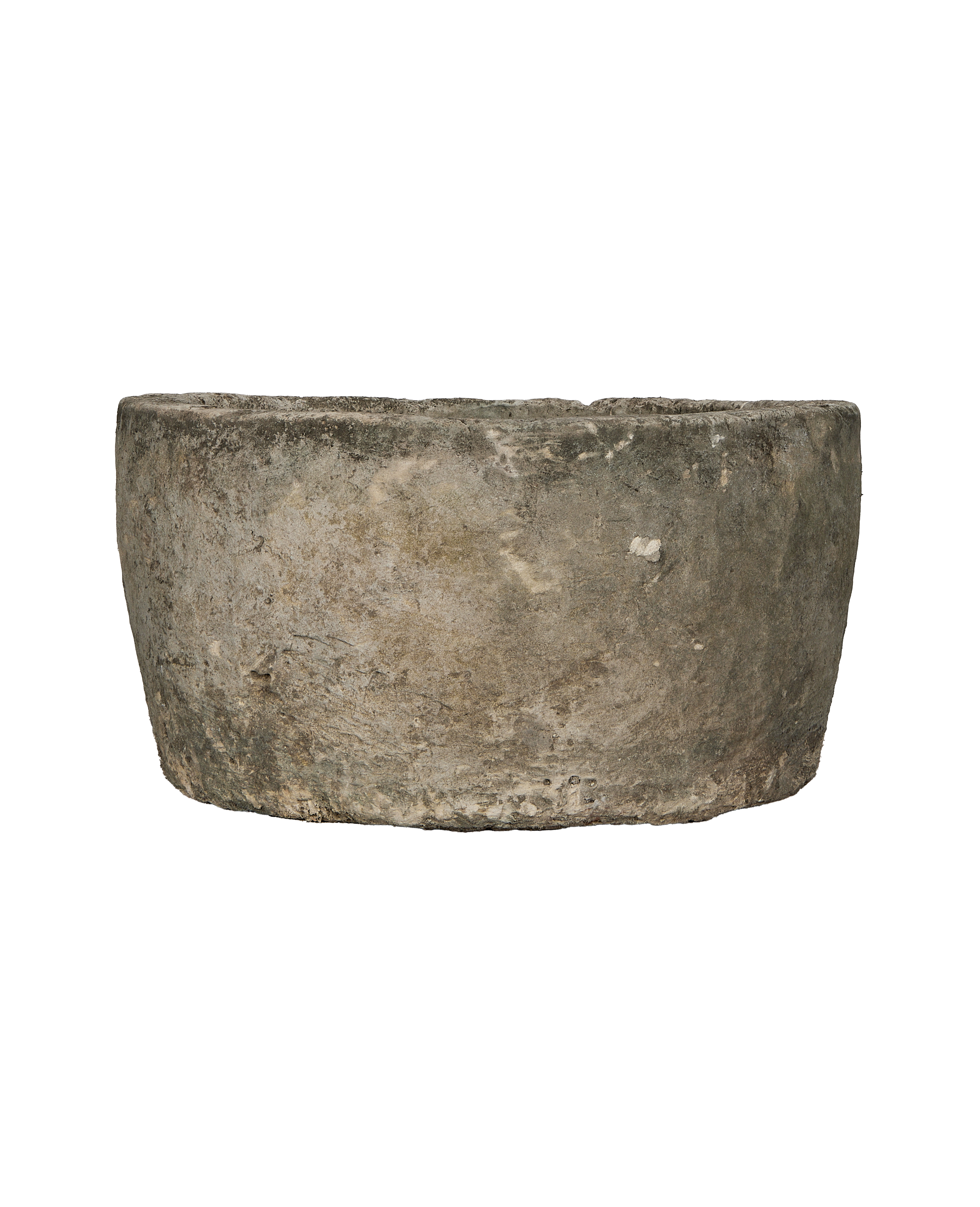 Vintage Indonesian limestone trough, showing weathered texture and unique organic rim.