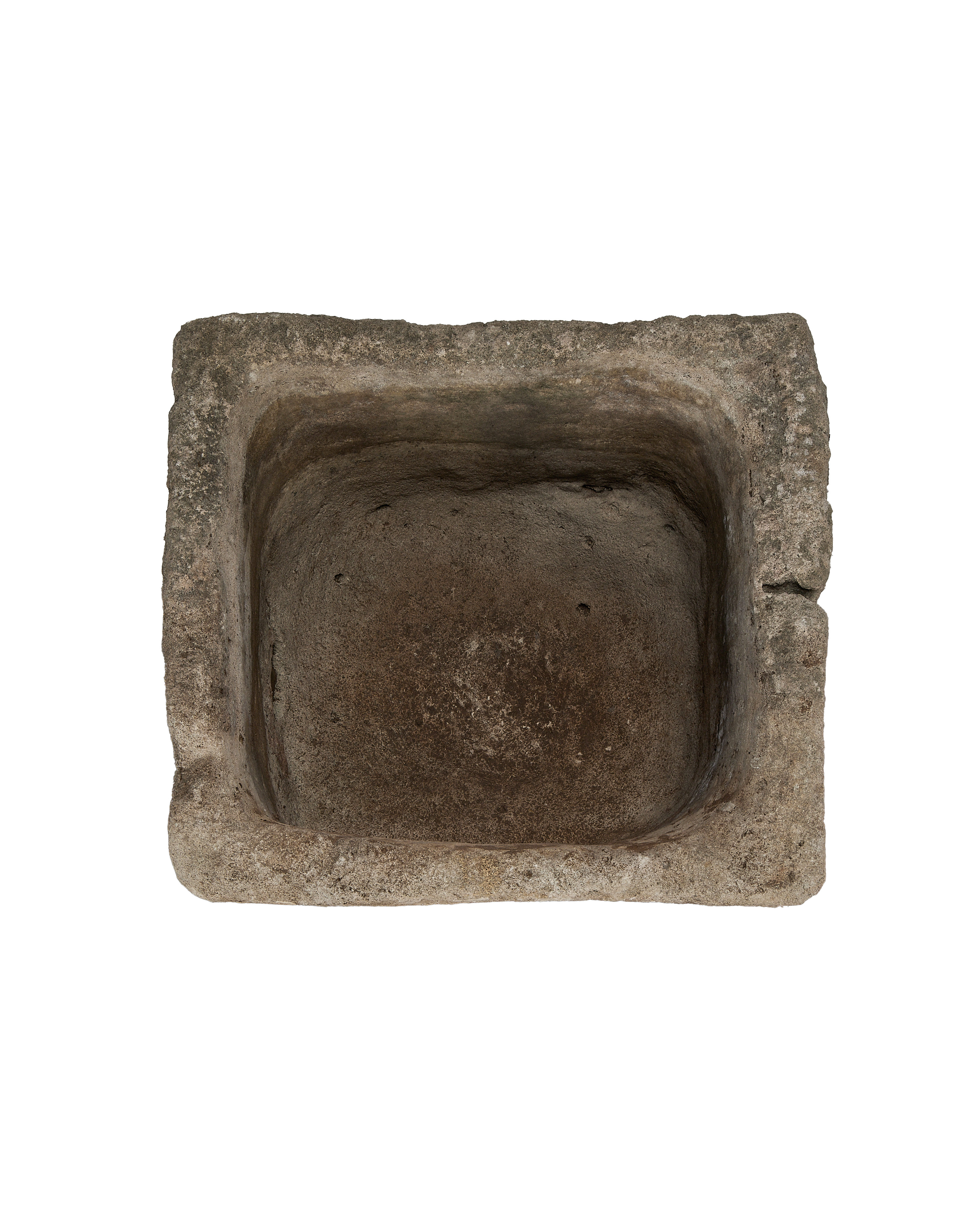 Vintage Indonesian limestone trough, top-down view showing weathered texture and square shape.