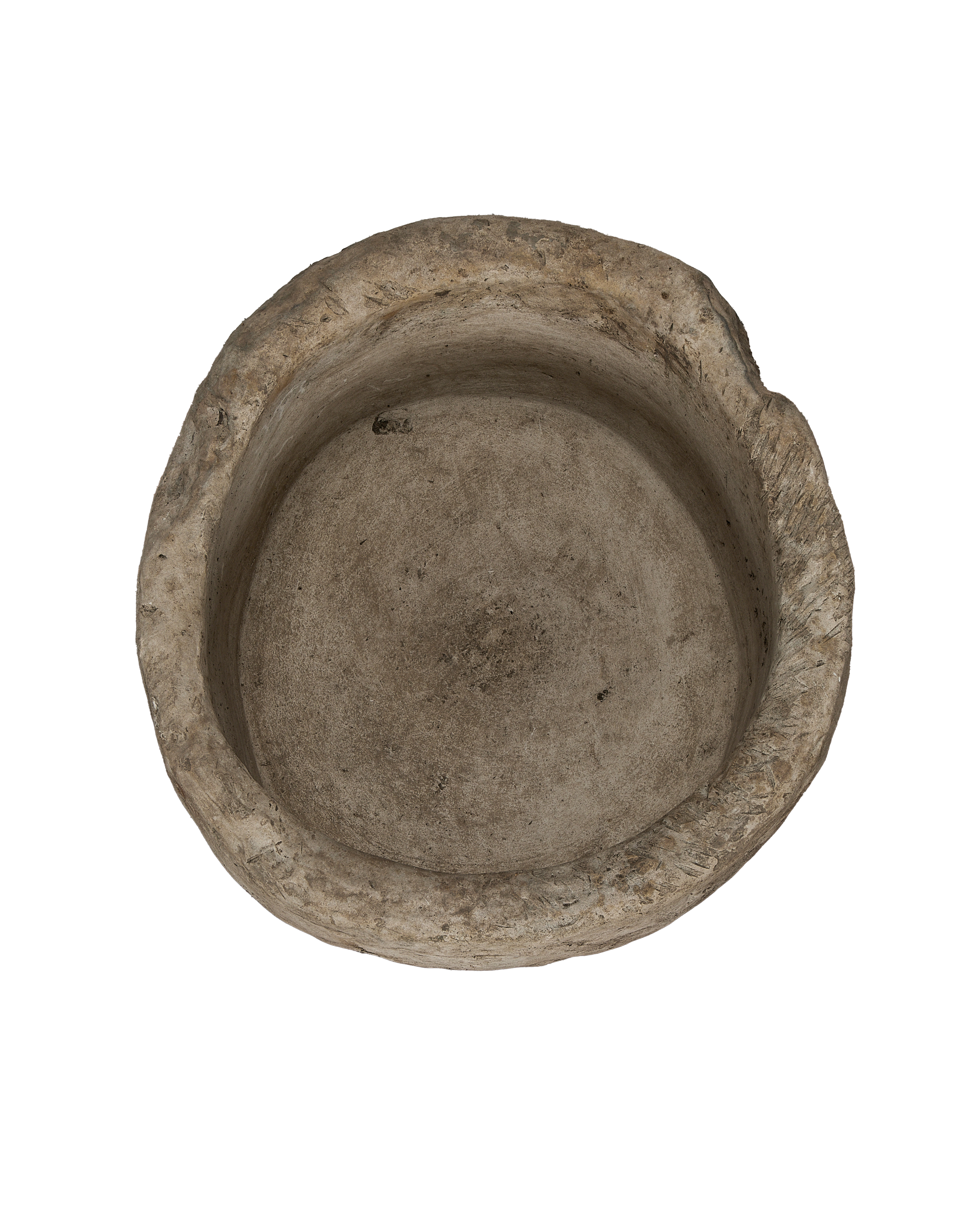 Vintage Indonesian round limestone trough, top-down view showing interior basin texture.