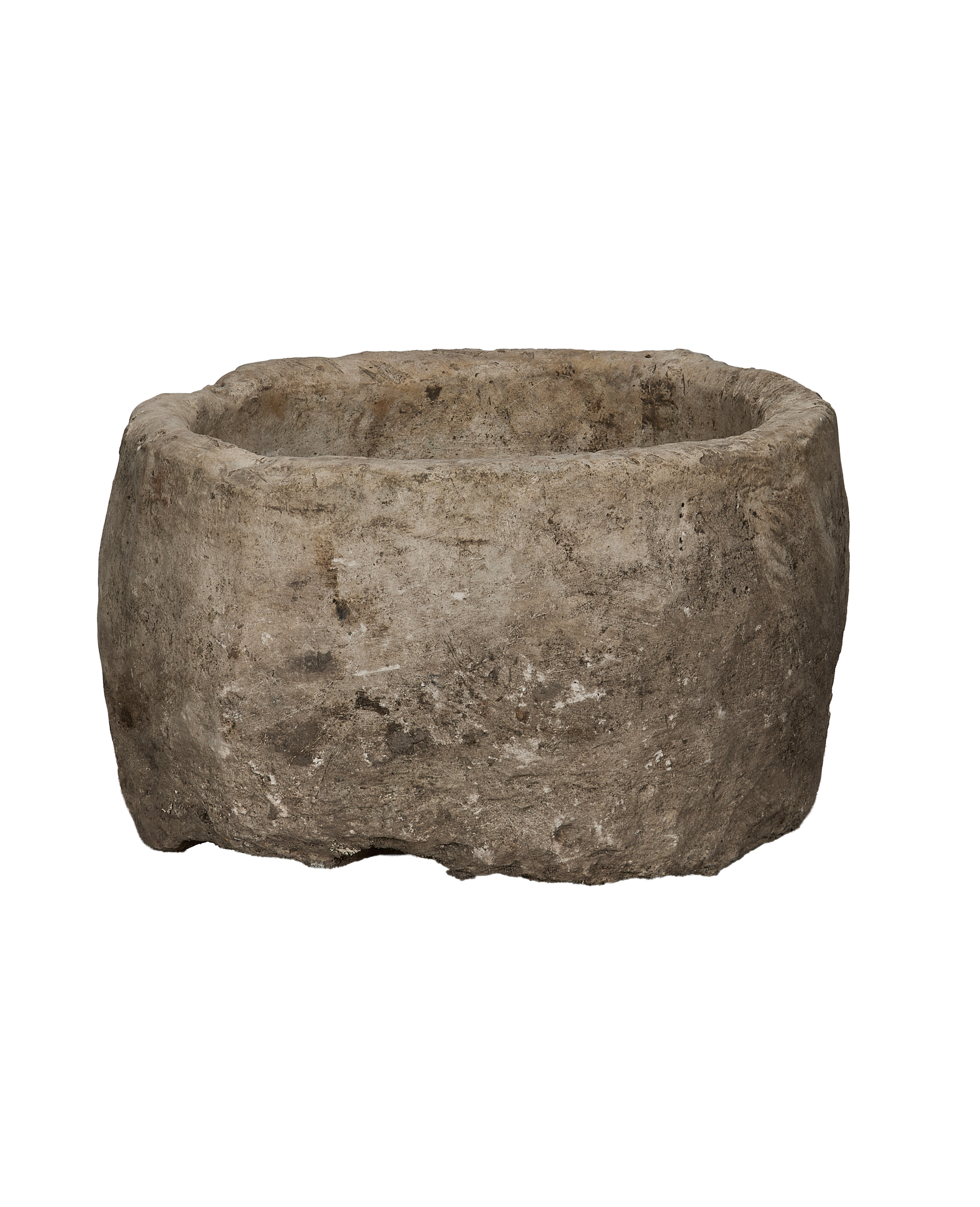 Vintage round limestone trough from Indonesia with rugged, weathered texture.