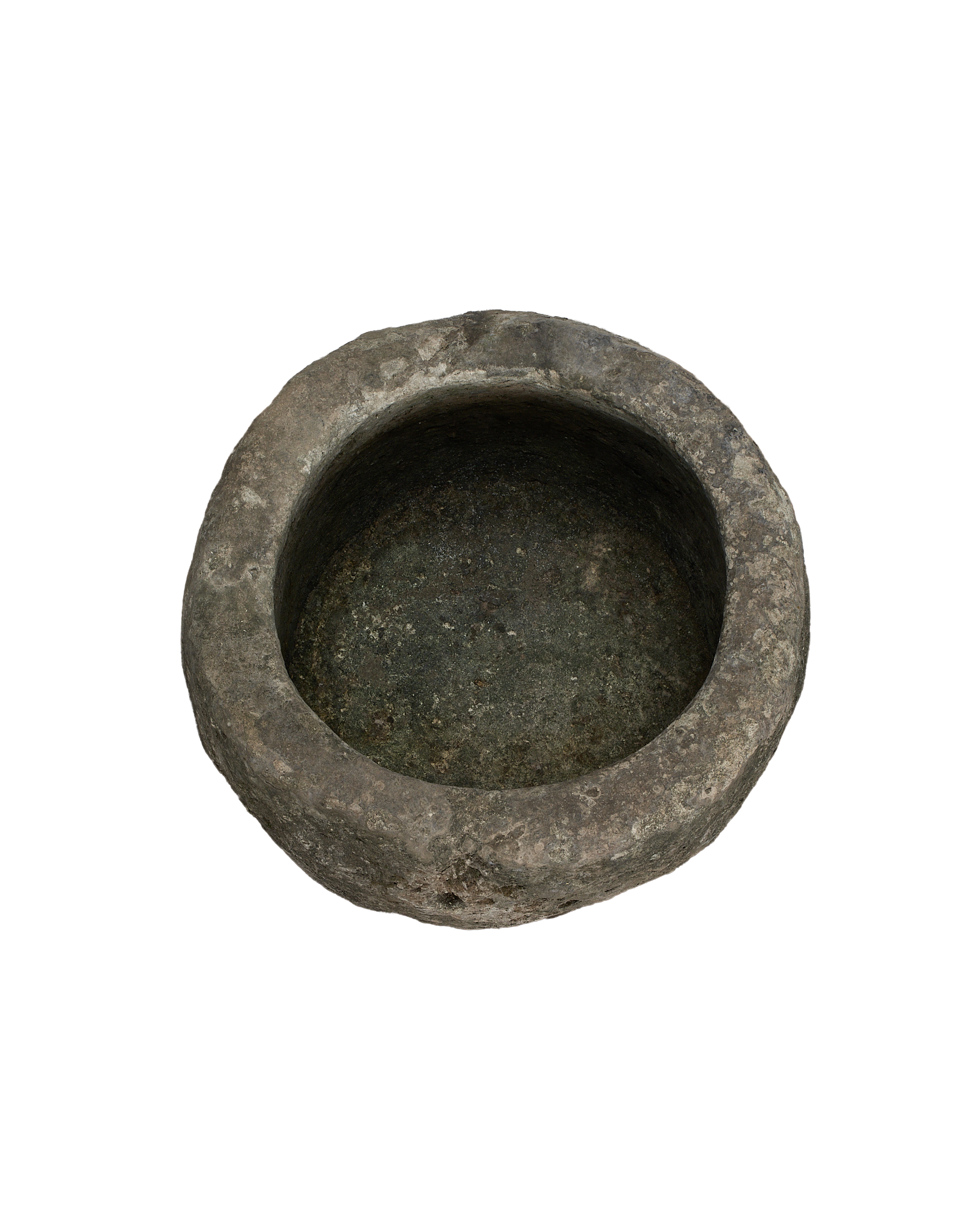 Vintage Indonesian round limestone trough, top view showcasing rough interior texture.