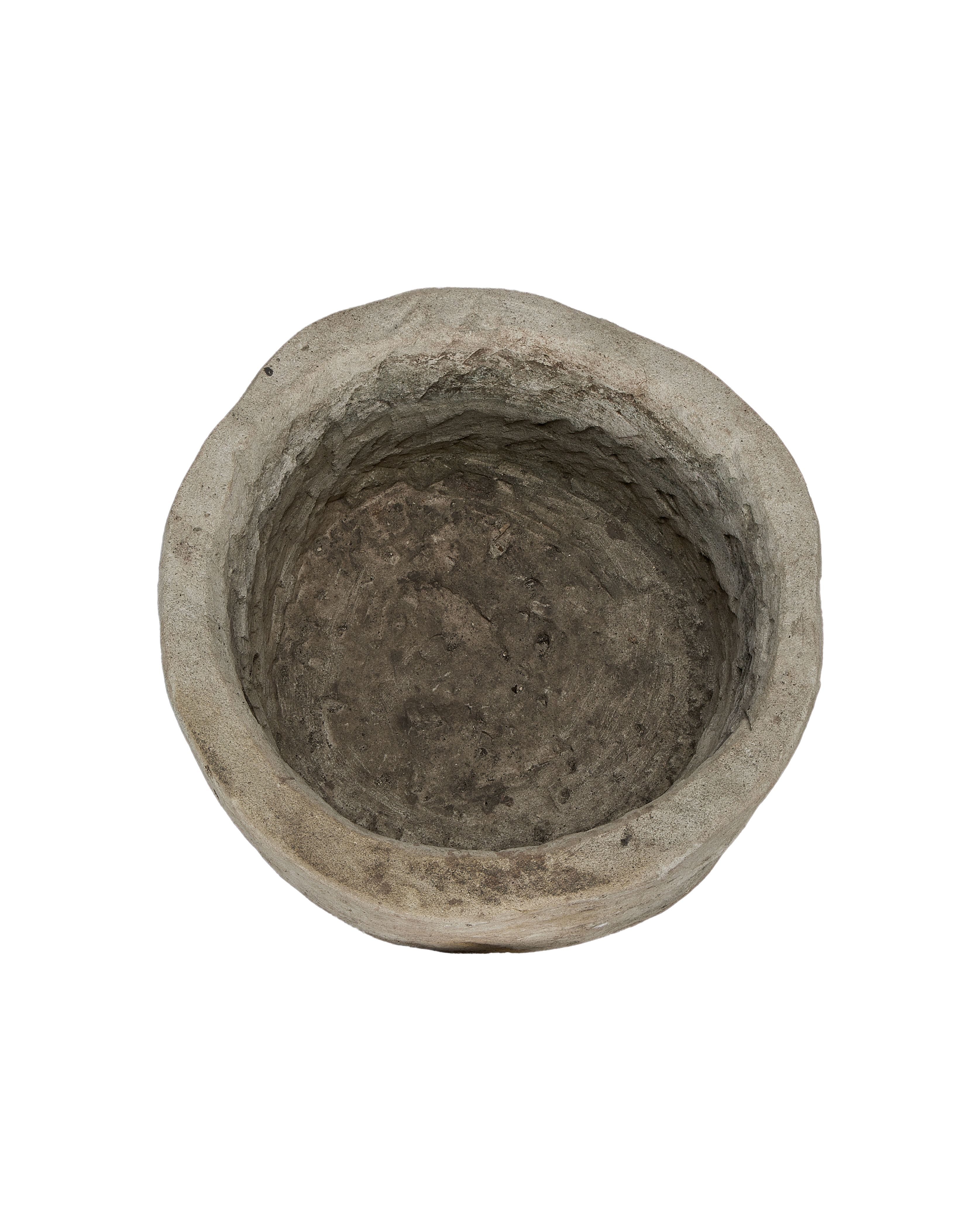 Round vintage Indonesian limestone trough from above, showing interior texture and worn rim.