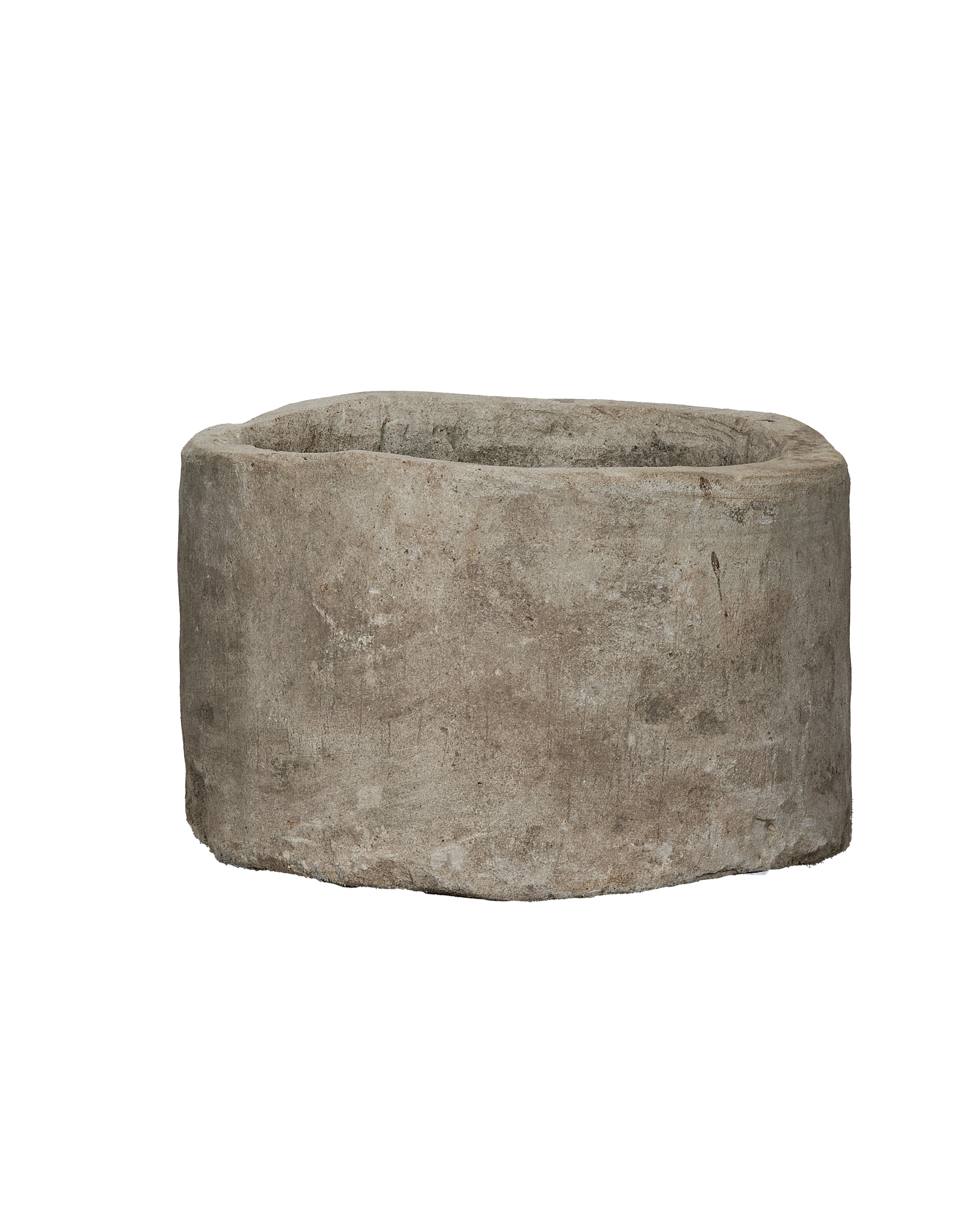 Vintage Indonesian limestone trough top-down shot, showcasing rough exterior texture and rustic basin.