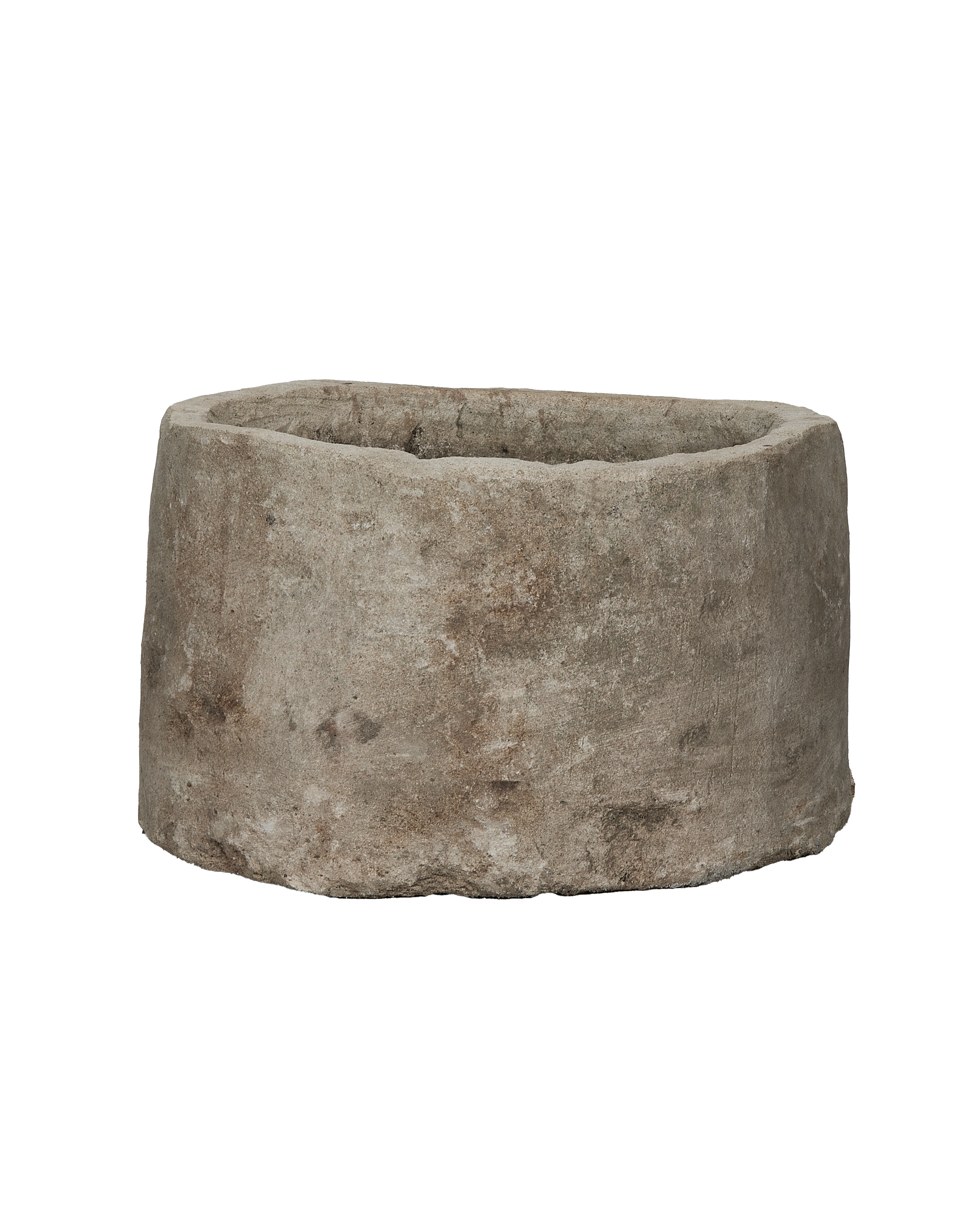 Vintage Indonesian round limestone trough, showing weathered texture and natural imperfections.