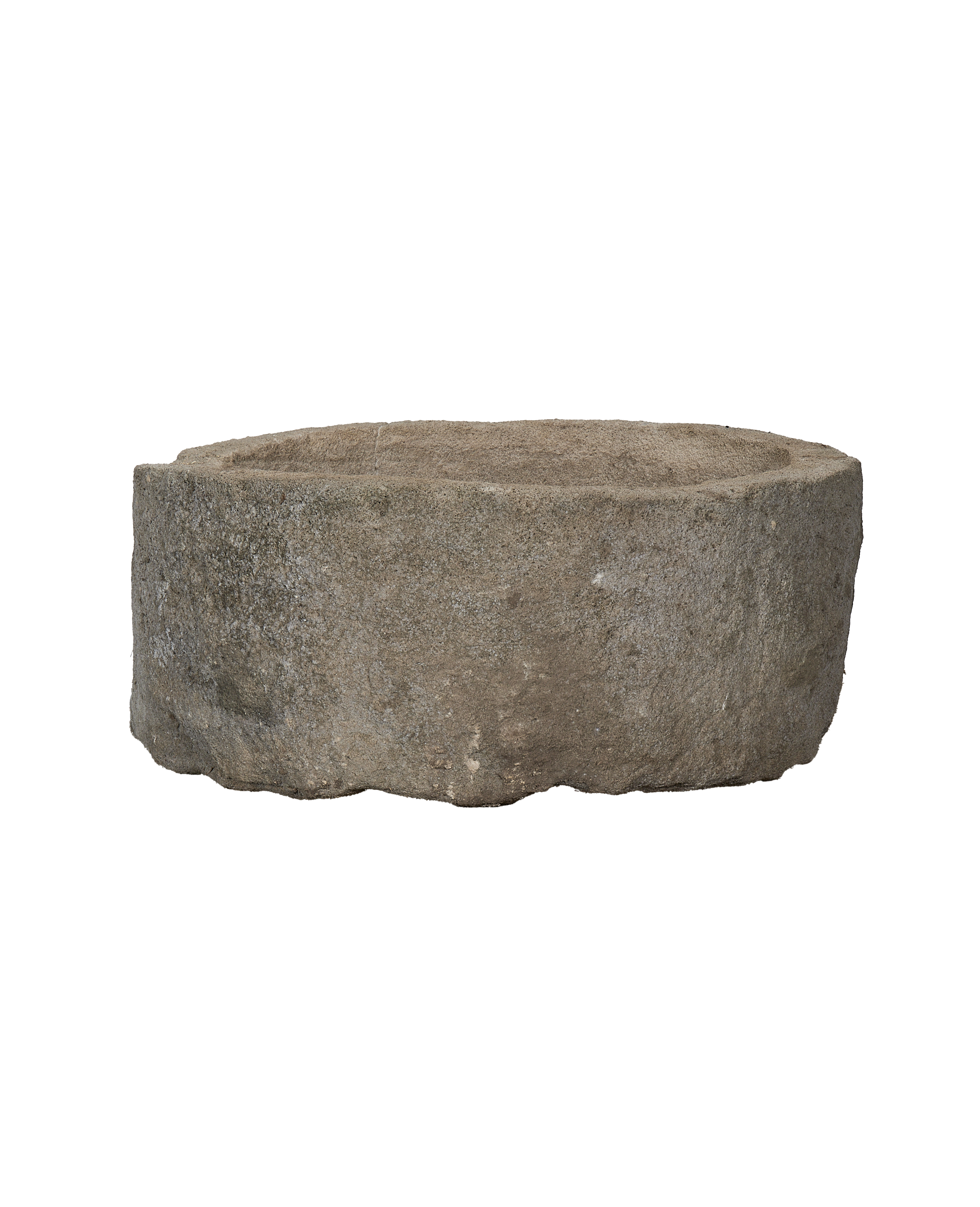 Vintage round limestone trough from Indonesia, with weathered, textured surface and rough-hewn edges.