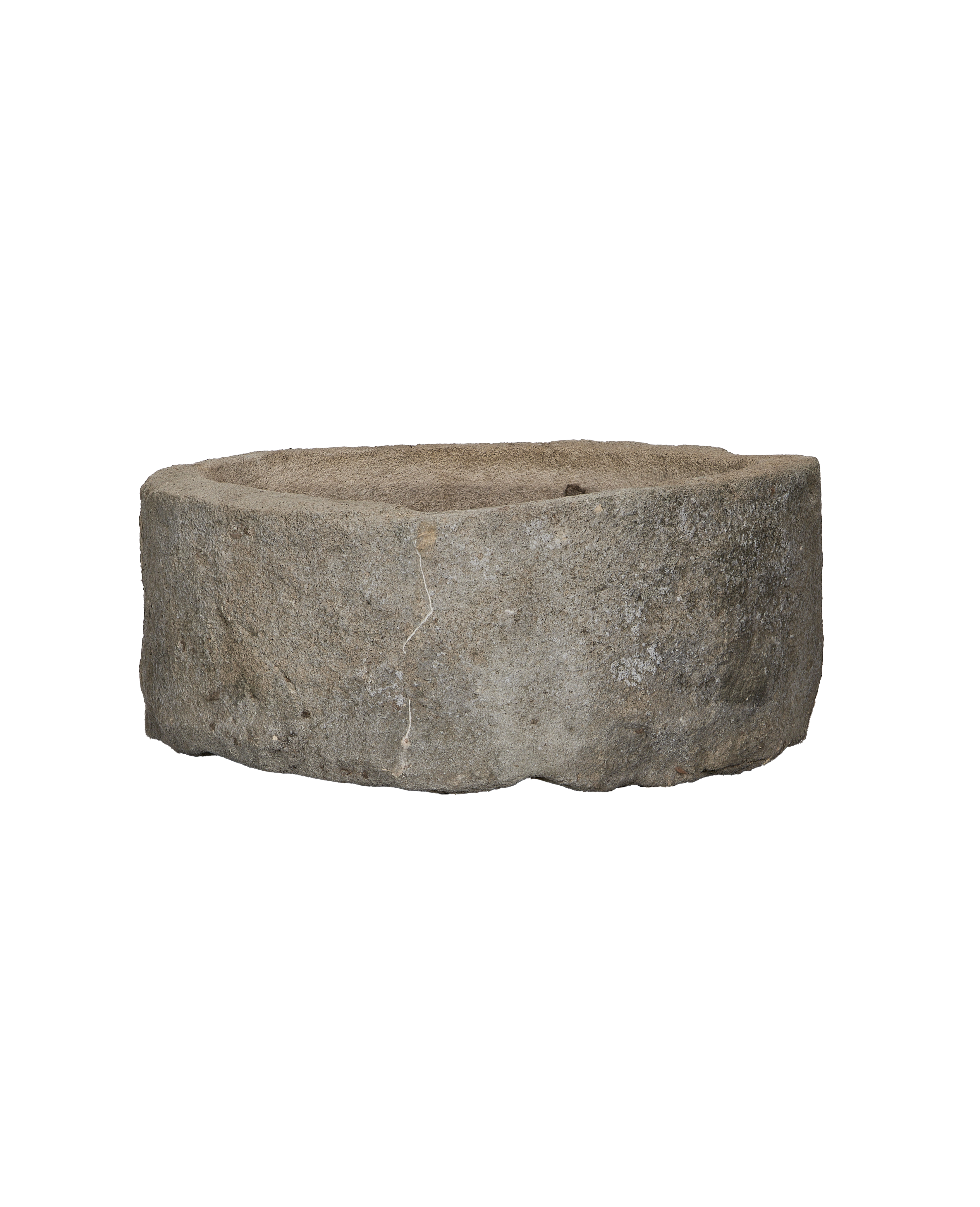 Round vintage Indonesian limestone trough showcasing natural texture and weathered crack detail.