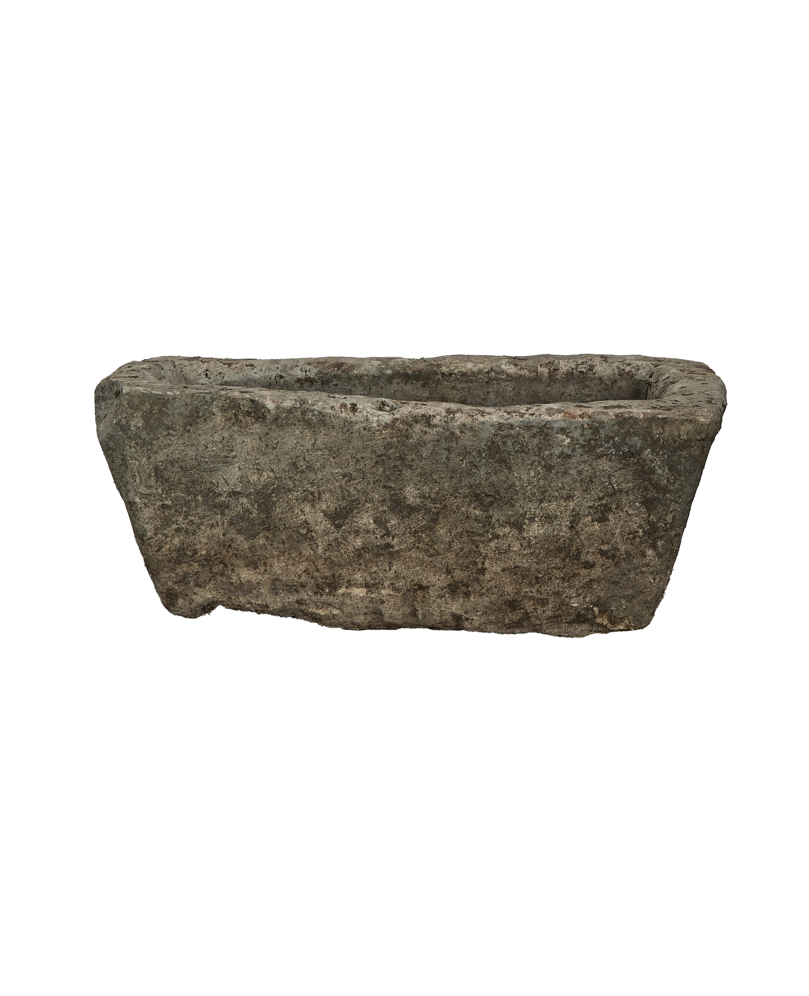 Vintage weathered Indonesian limestone trough from an elevated side angle, showcasing texture.