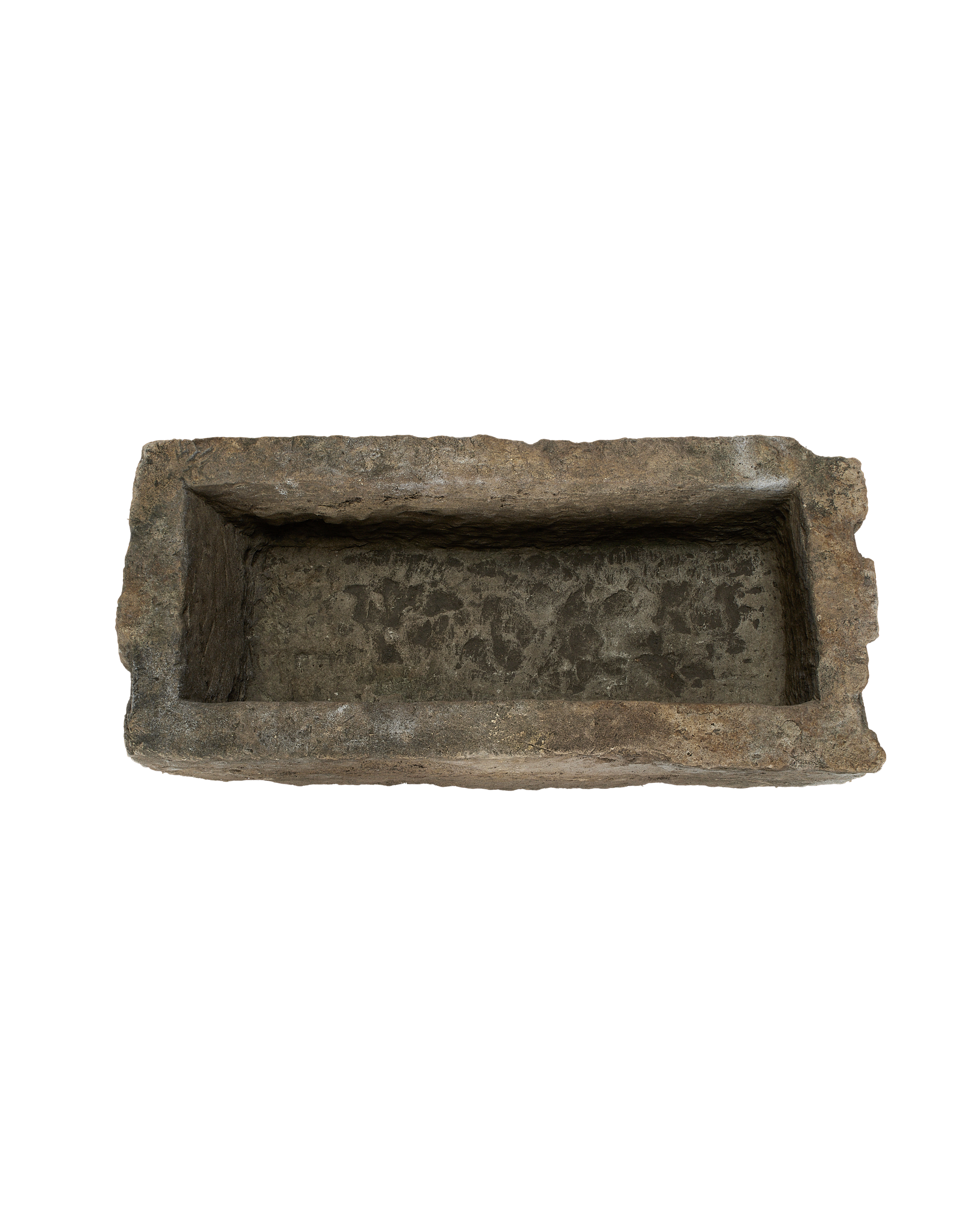 Vintage rectangular Indonesian limestone trough, top-down view highlighting rough, weathered interior texture.