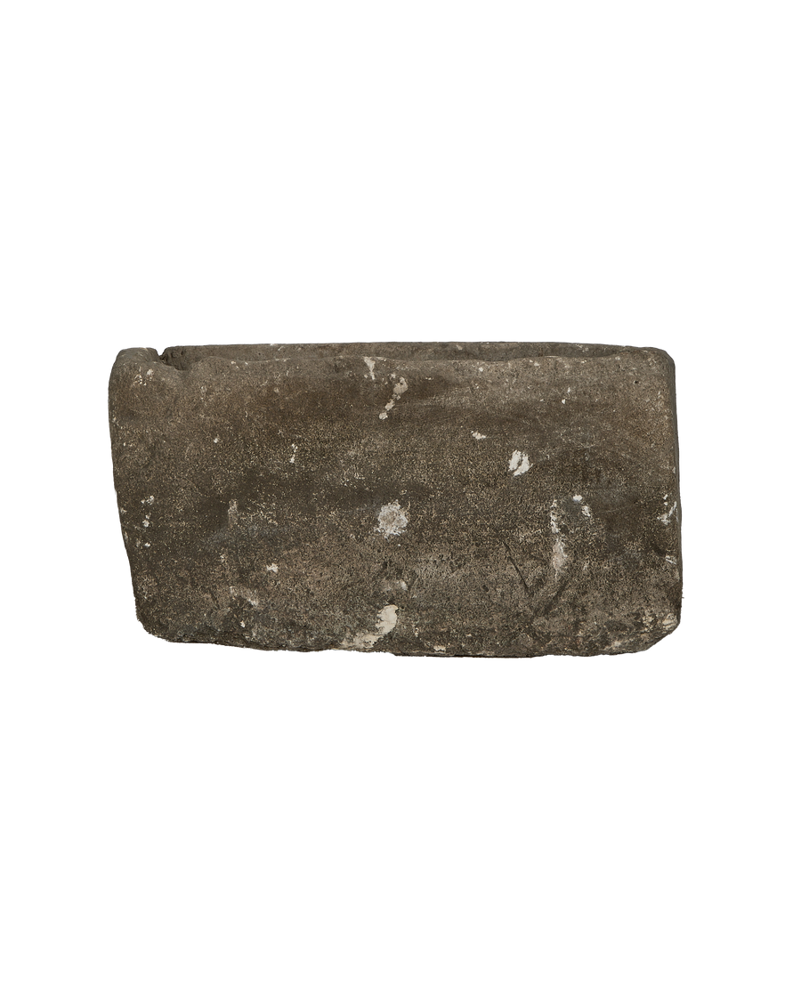 Vintage Indonesian limestone trough, showing weathered texture and natural imperfections from an overhead view.