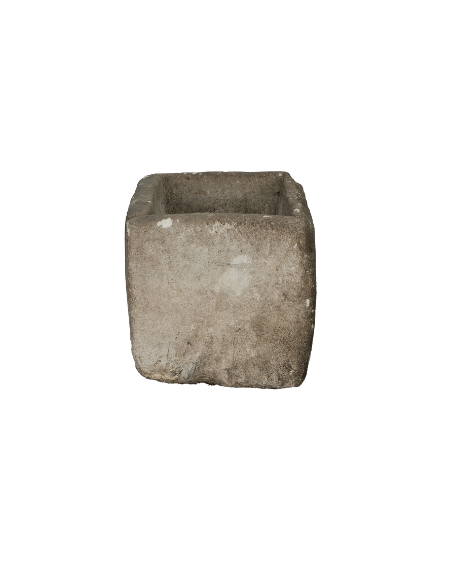 Vintage Indonesian limestone trough, top view with weathered interior details.