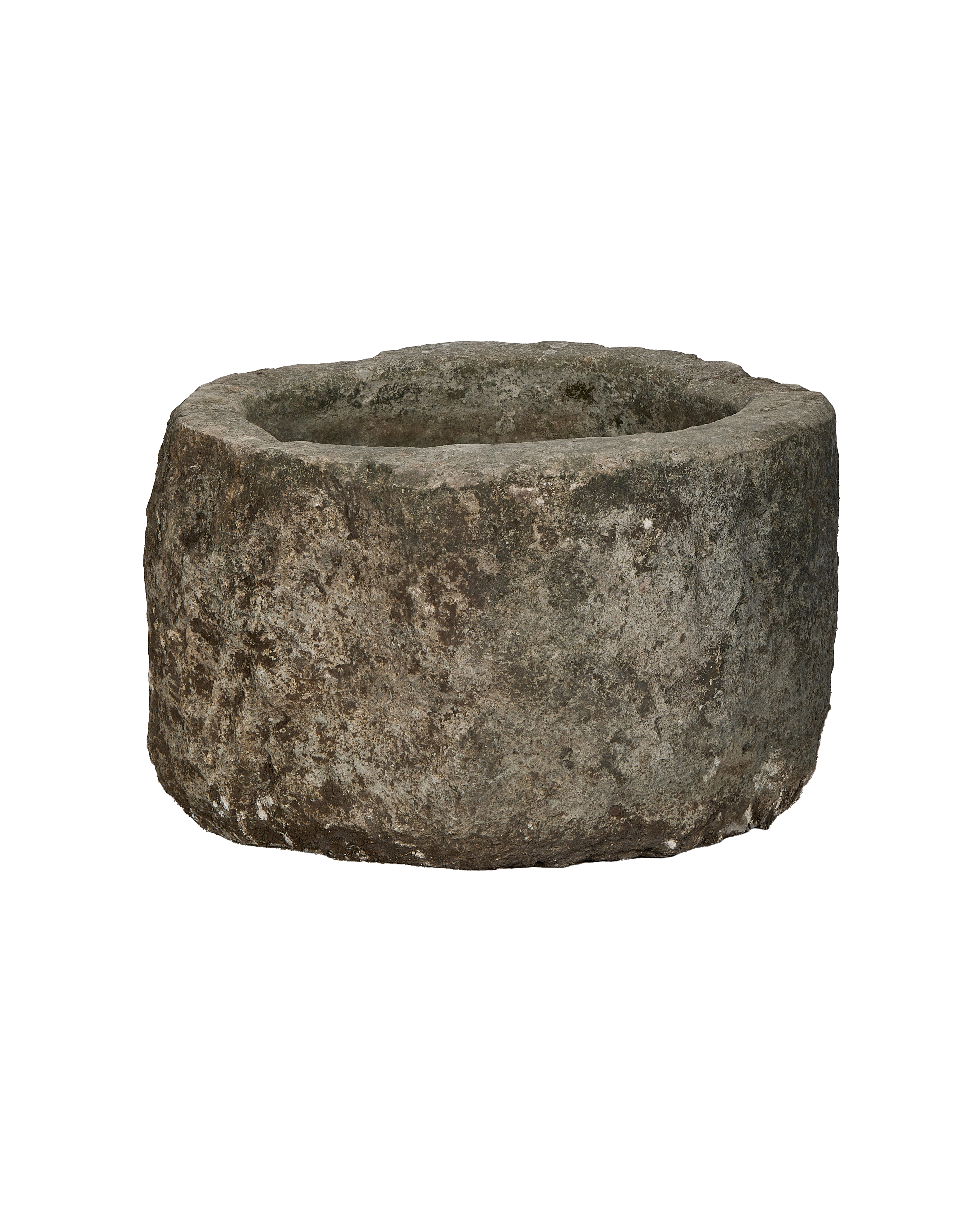 Vintage round limestone trough, rich natural texture, weathered surface.