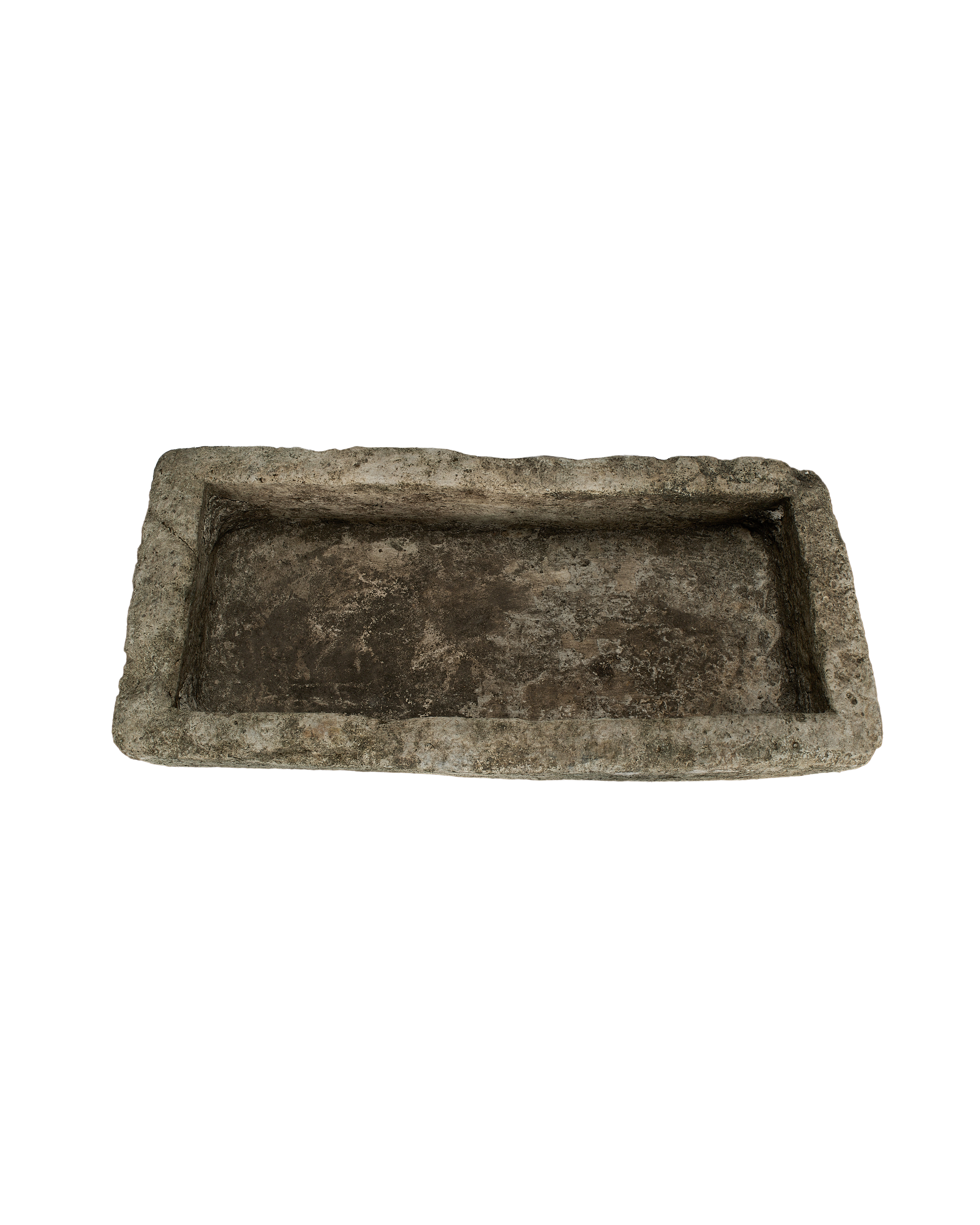 Vintage rectangular limestone trough, top view down showing weathered, textured interior.