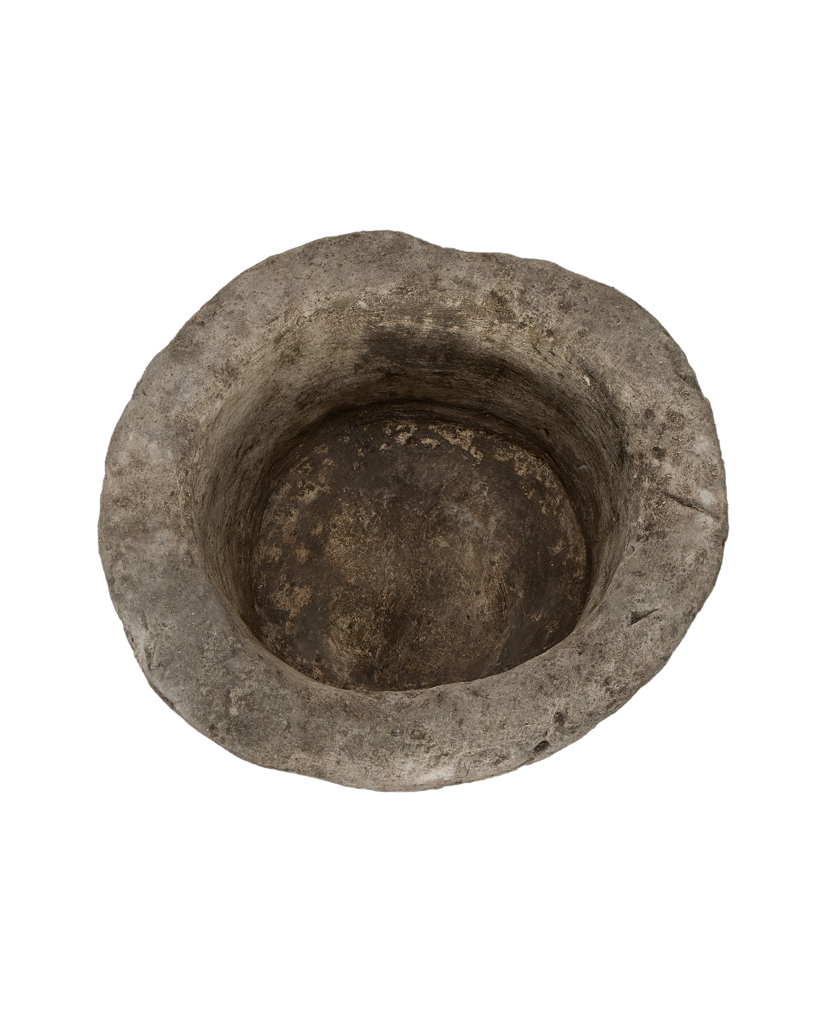 Vintage Indonesian round limestone trough, showing weathered interior basin from overhead angle.