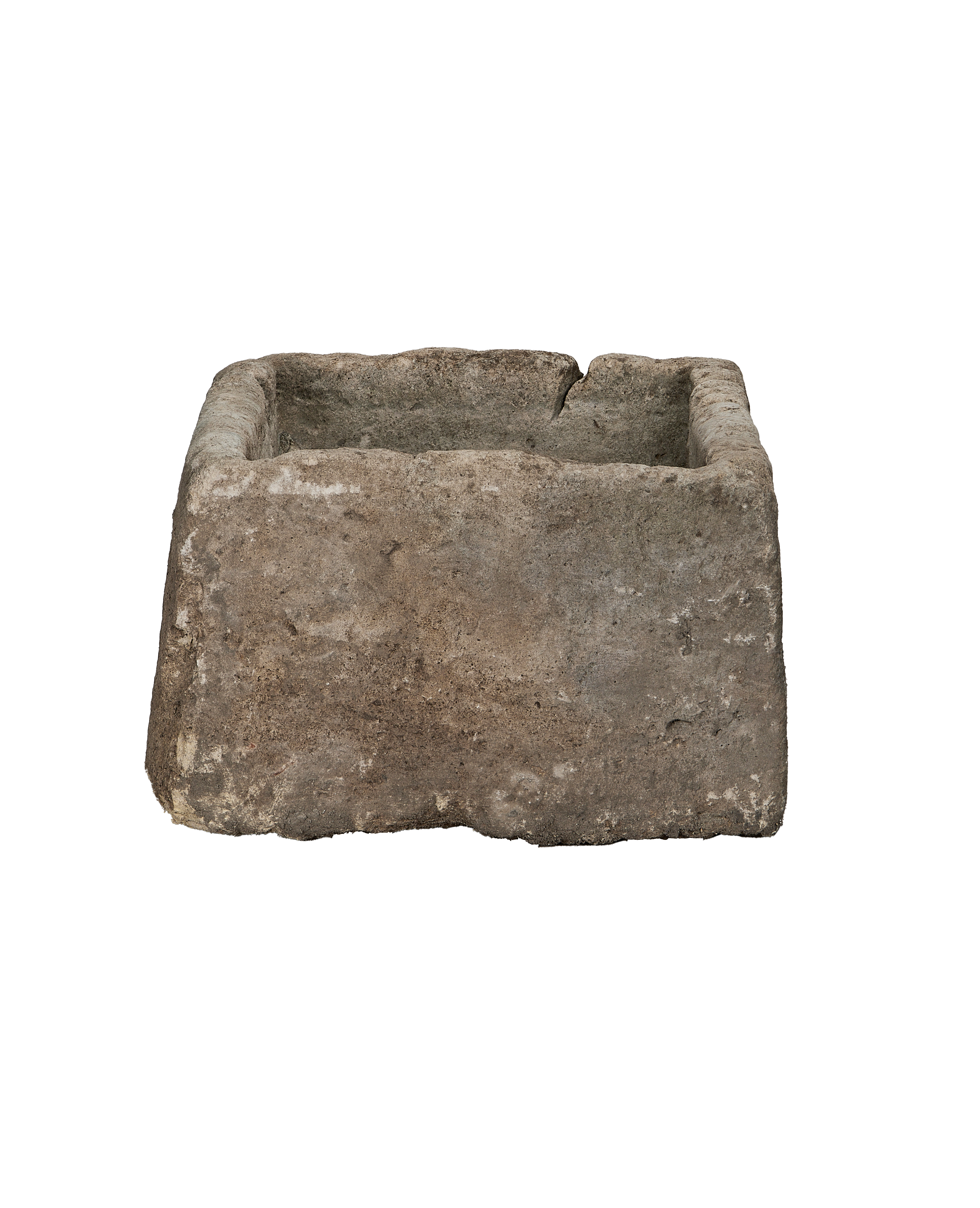 Vintage rectangular Indonesian limestone trough with weathered dark gray texture and a crack on the rim.